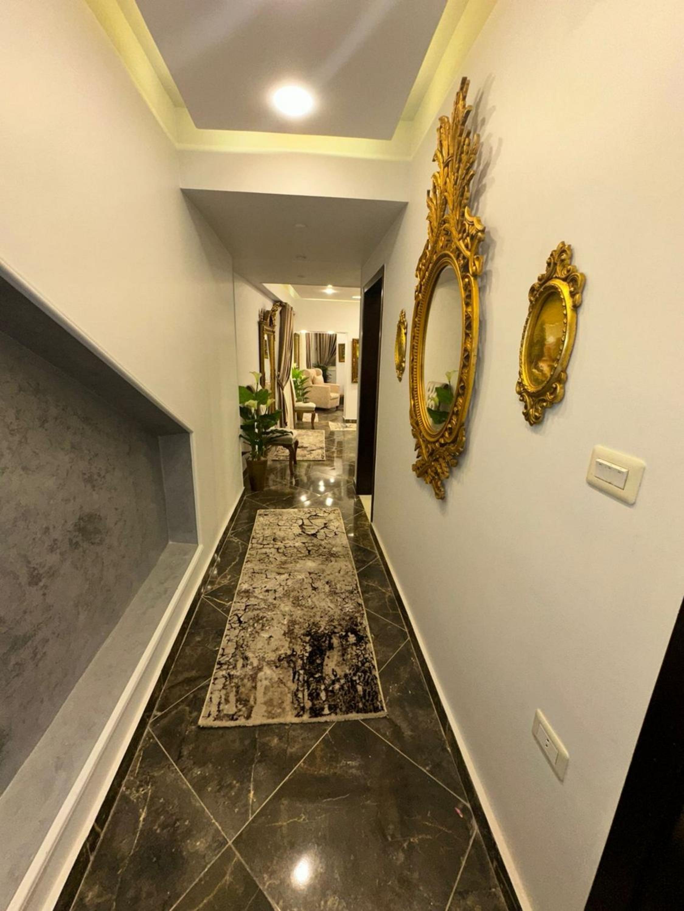 Well-furnished 2BR Apartment in Sphinx Square El Agouza