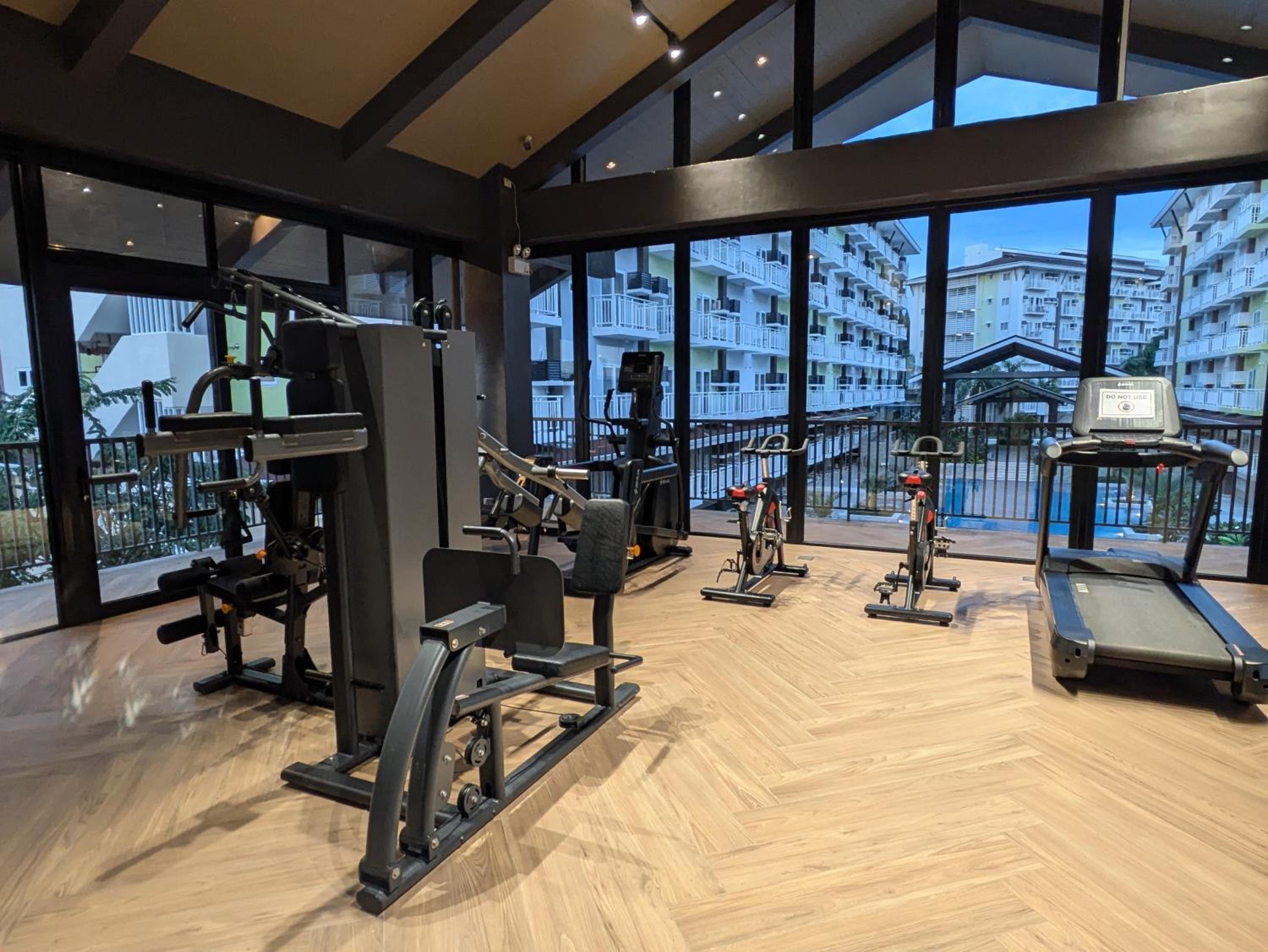 Near Airport, Affordable Coliving Space for Backpackers with Pool, Gym, and More view 2