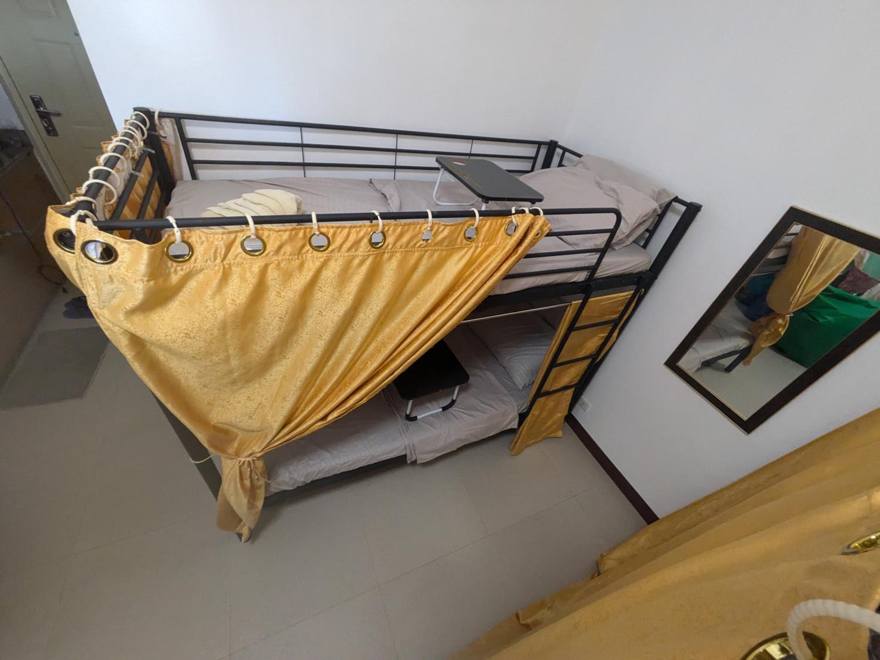 Near Airport, Affordable Coliving Space for Backpackers with Pool, Gym, and More view 4