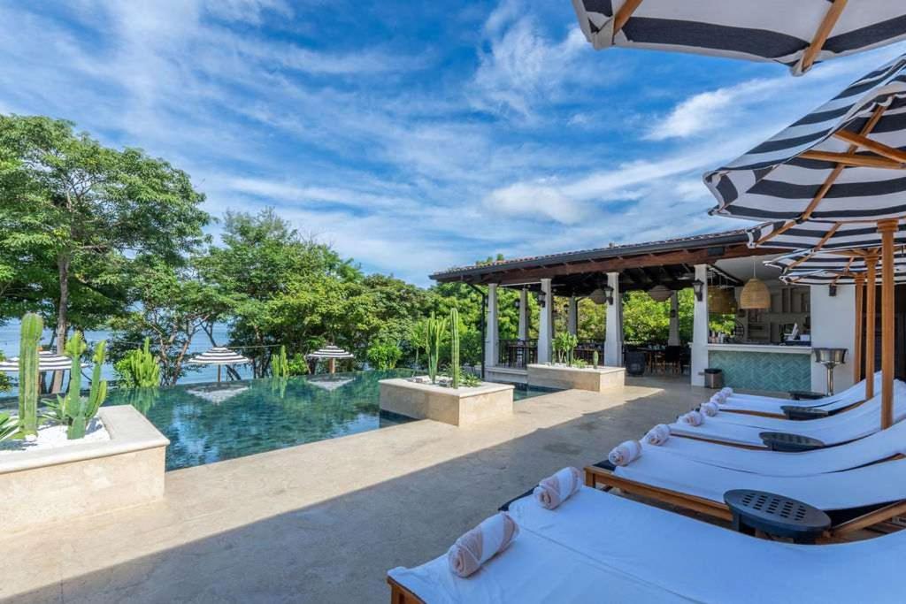 Mediterranean-Style Villa with a Private Plunge Pool, Ocean Views, and Exclusive Beach Club Access