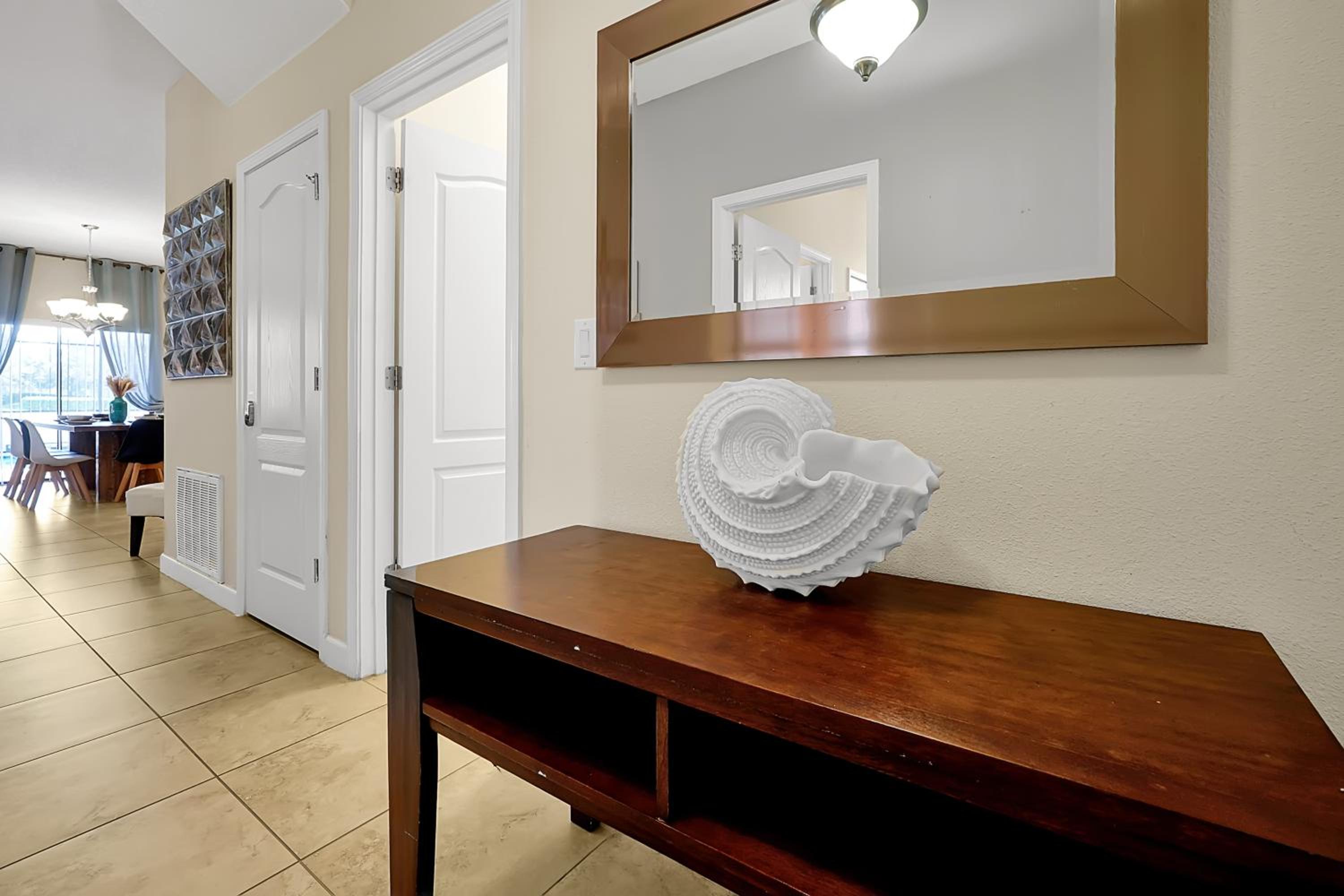 Embrace Disney Magic at Our Luxe 6-BR Villa in ChampionsGate!