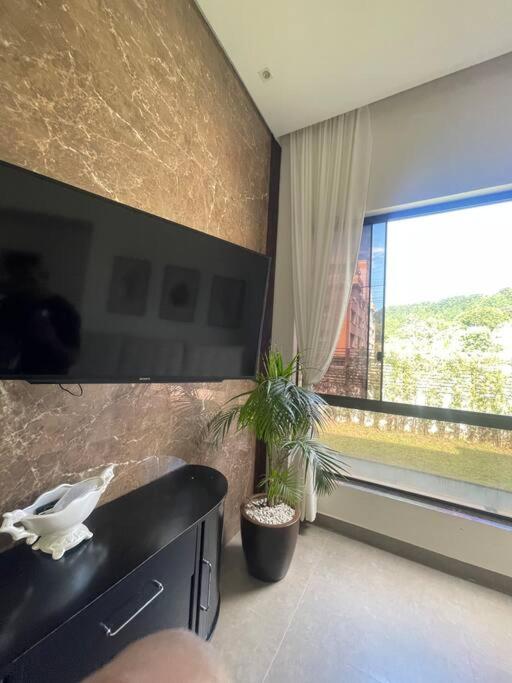 Linda Casa 4 quartos com piscina para família na praia de Canasvieiras