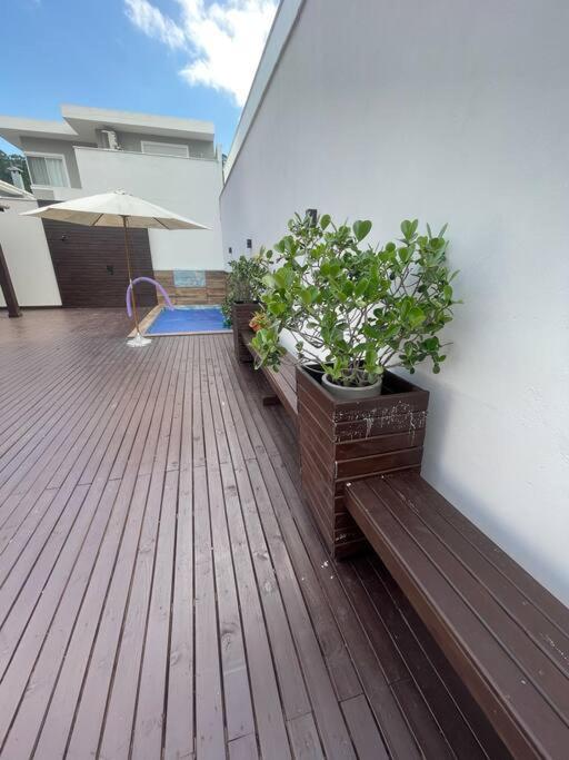 Linda Casa 4 quartos com piscina para família na praia de Canasvieiras