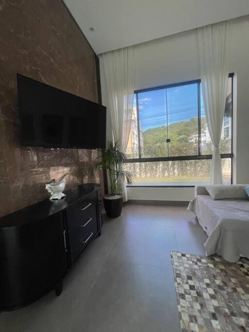 Linda Casa 4 quartos com piscina para família na praia de Canasvieiras