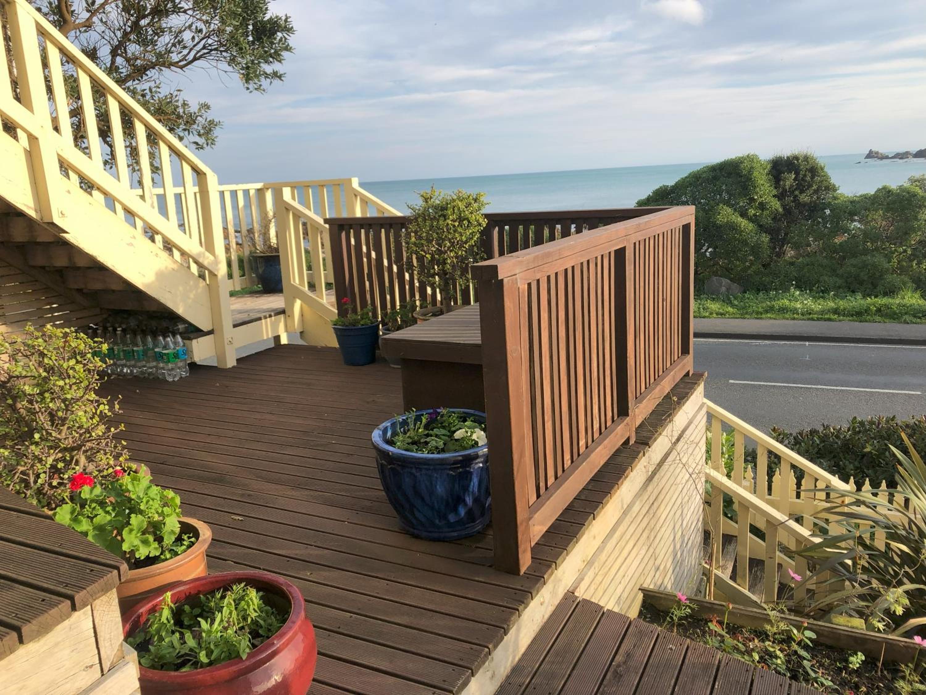 Seafront Haven in Island Bay with Deck, Outdoor Bath, and Parking view 2
