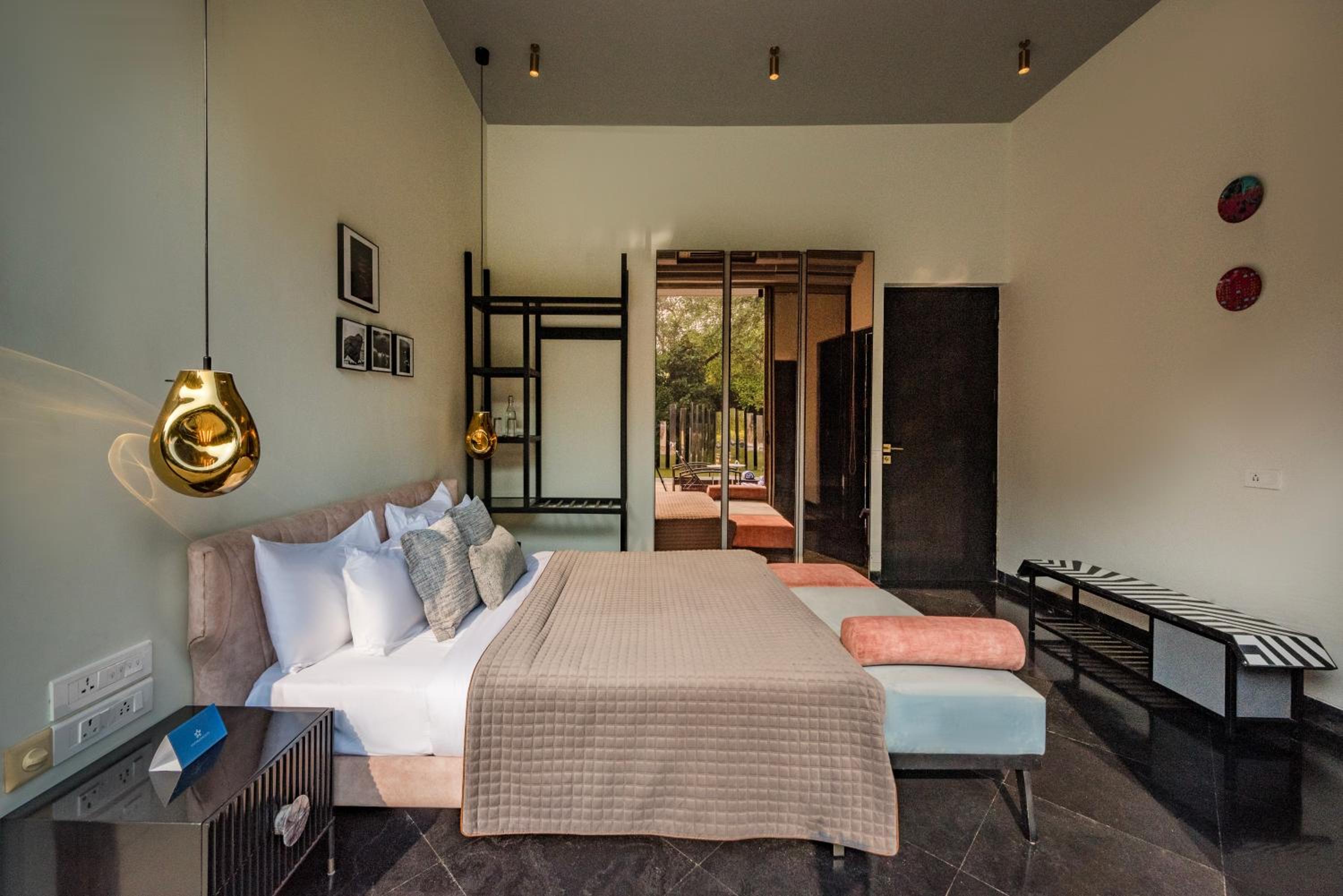 SaffronStays Glasshouse 91 - 4BR luxury villa with pool, art installations, lawns & outdoor dining