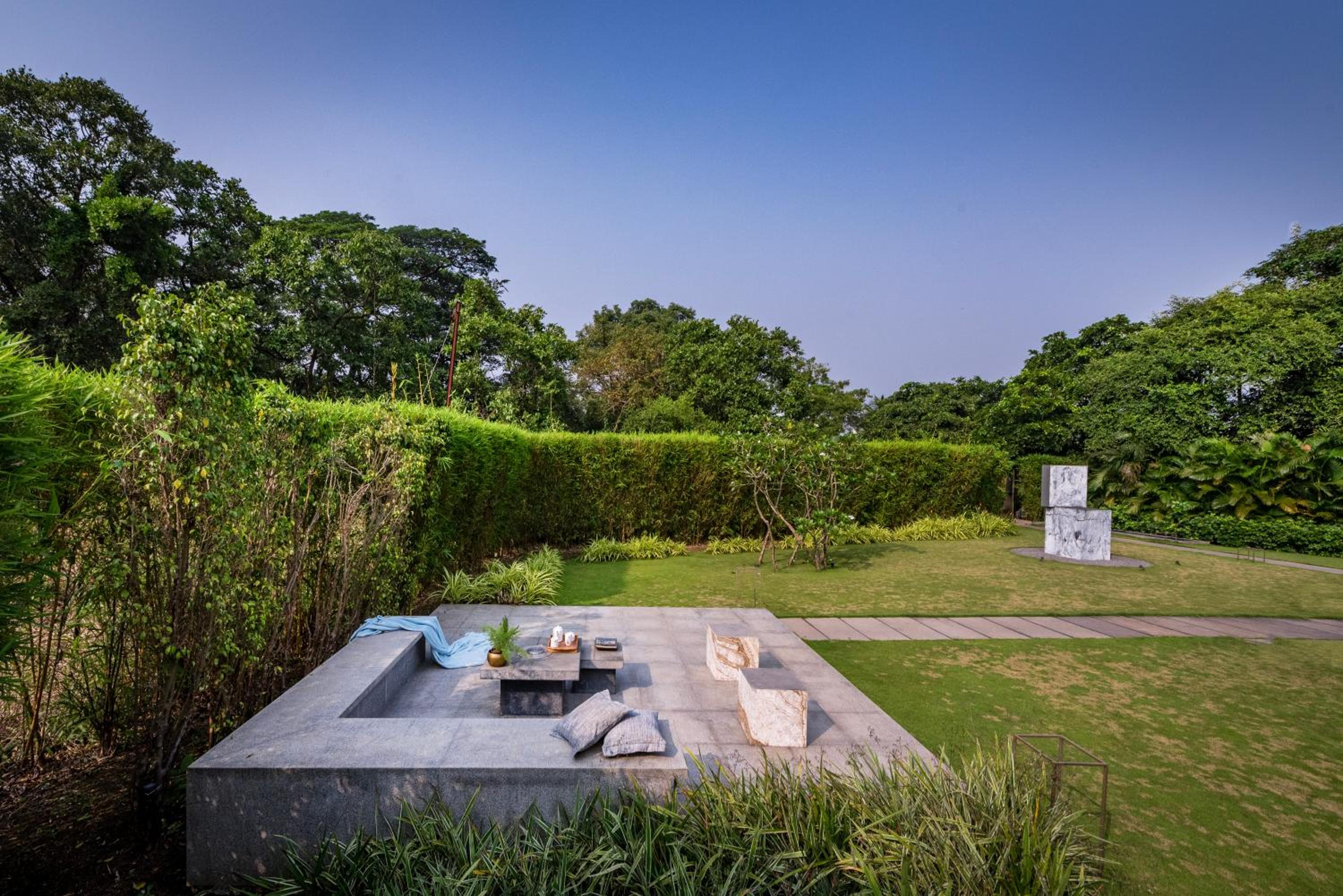 SaffronStays Glasshouse 91 - 4BR luxury villa with pool, art installations, lawns & outdoor dining