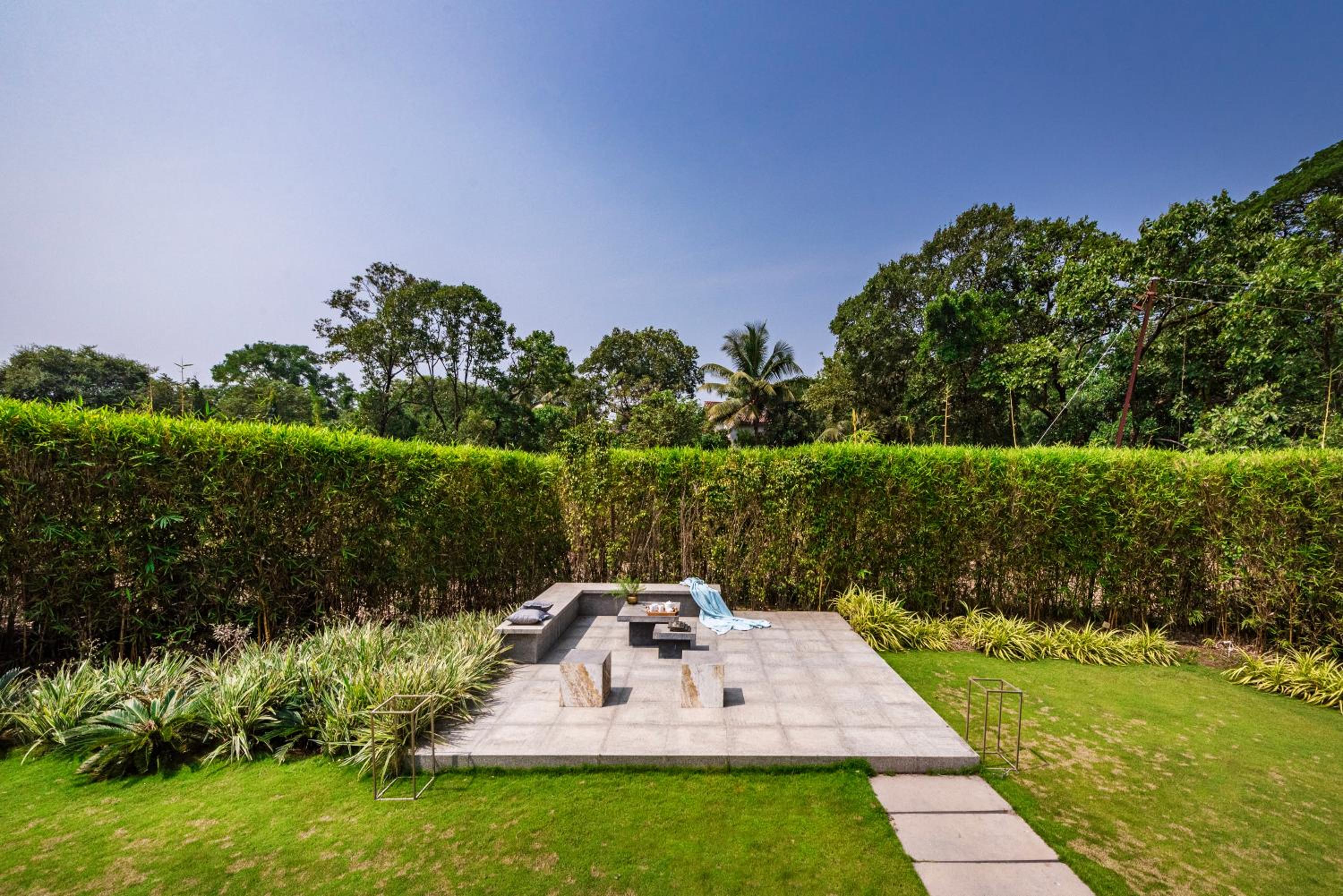 SaffronStays Glasshouse 91 - 4BR luxury villa with pool, art installations, lawns & outdoor dining