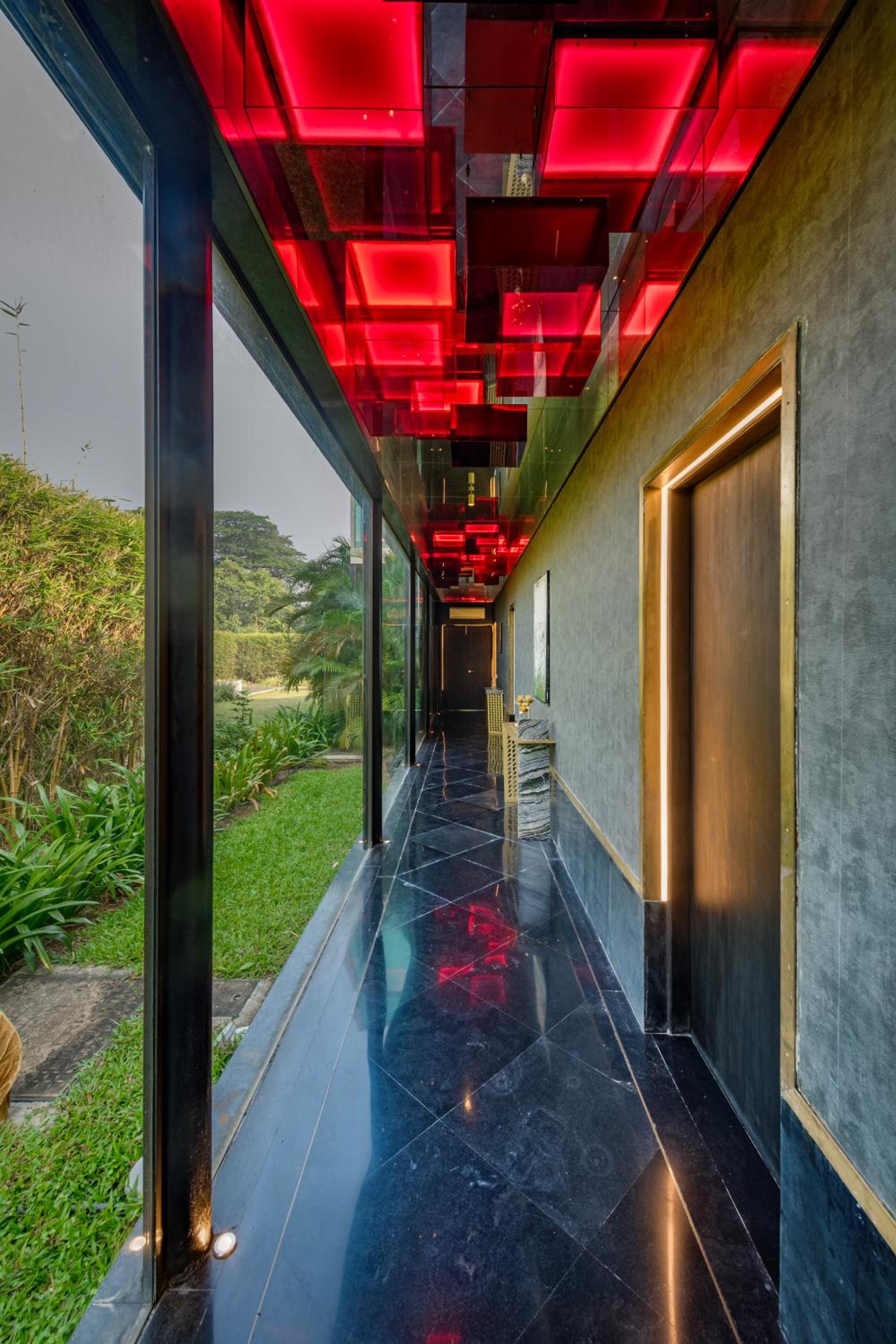 SaffronStays Glasshouse 91 - 4BR luxury villa with pool, art installations, lawns & outdoor dining