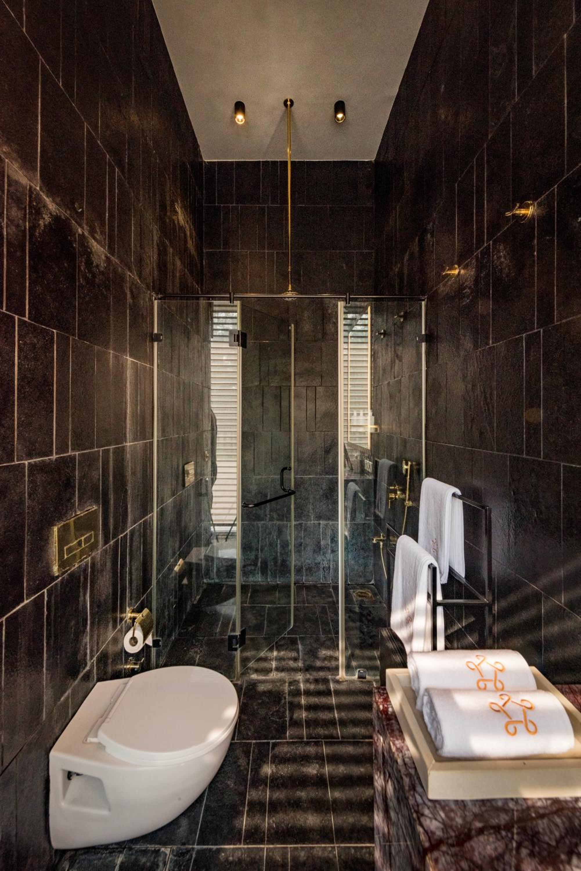 SaffronStays Glasshouse 91 - 4BR luxury villa with pool, art installations, lawns & outdoor dining