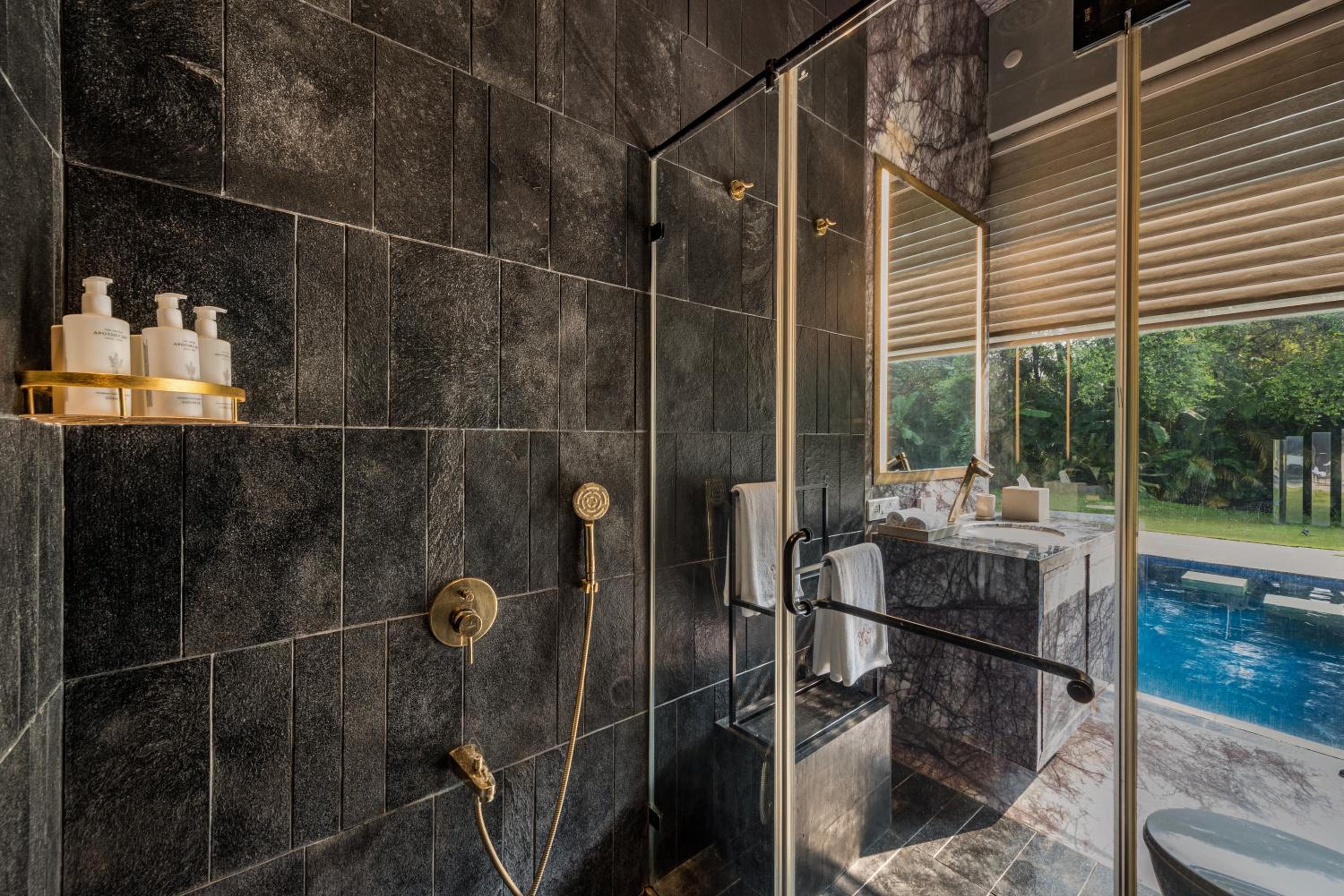 SaffronStays Glasshouse 91 - 4BR luxury villa with pool, art installations, lawns & outdoor dining
