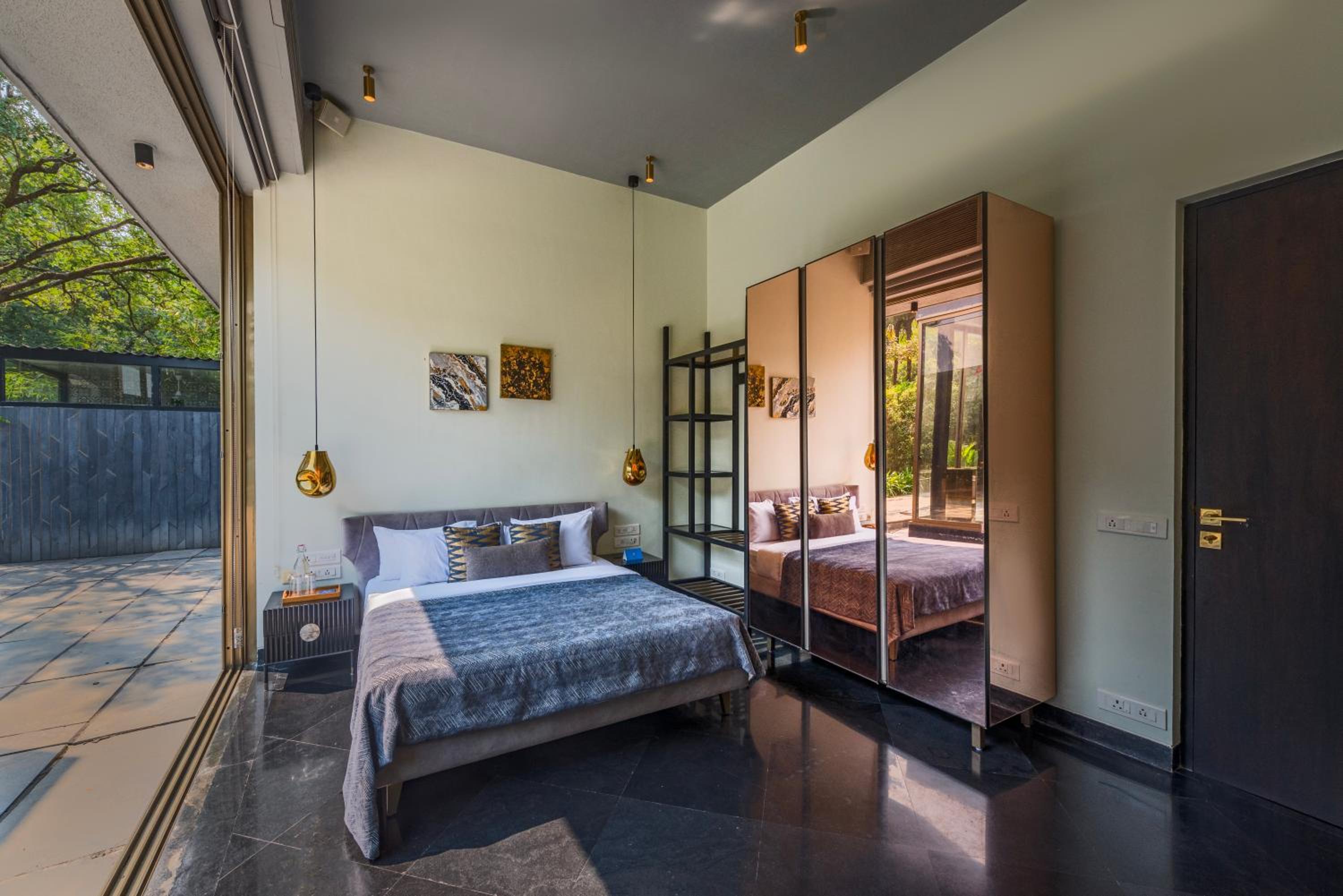 SaffronStays Glasshouse 91 - 4BR luxury villa with pool, art installations, lawns & outdoor dining