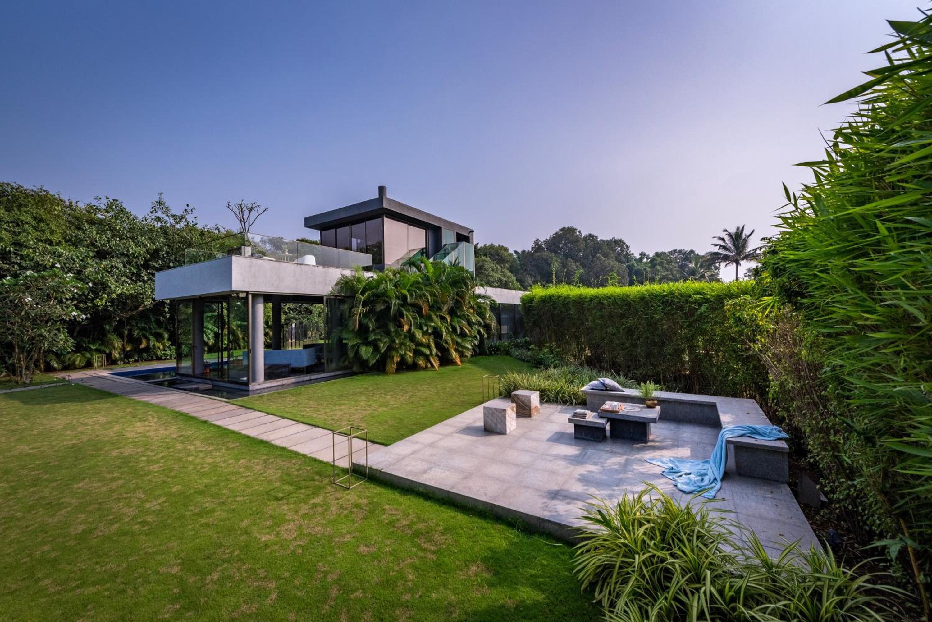 SaffronStays Glasshouse 91 - 4BR luxury villa with pool, art installations, lawns & outdoor dining
