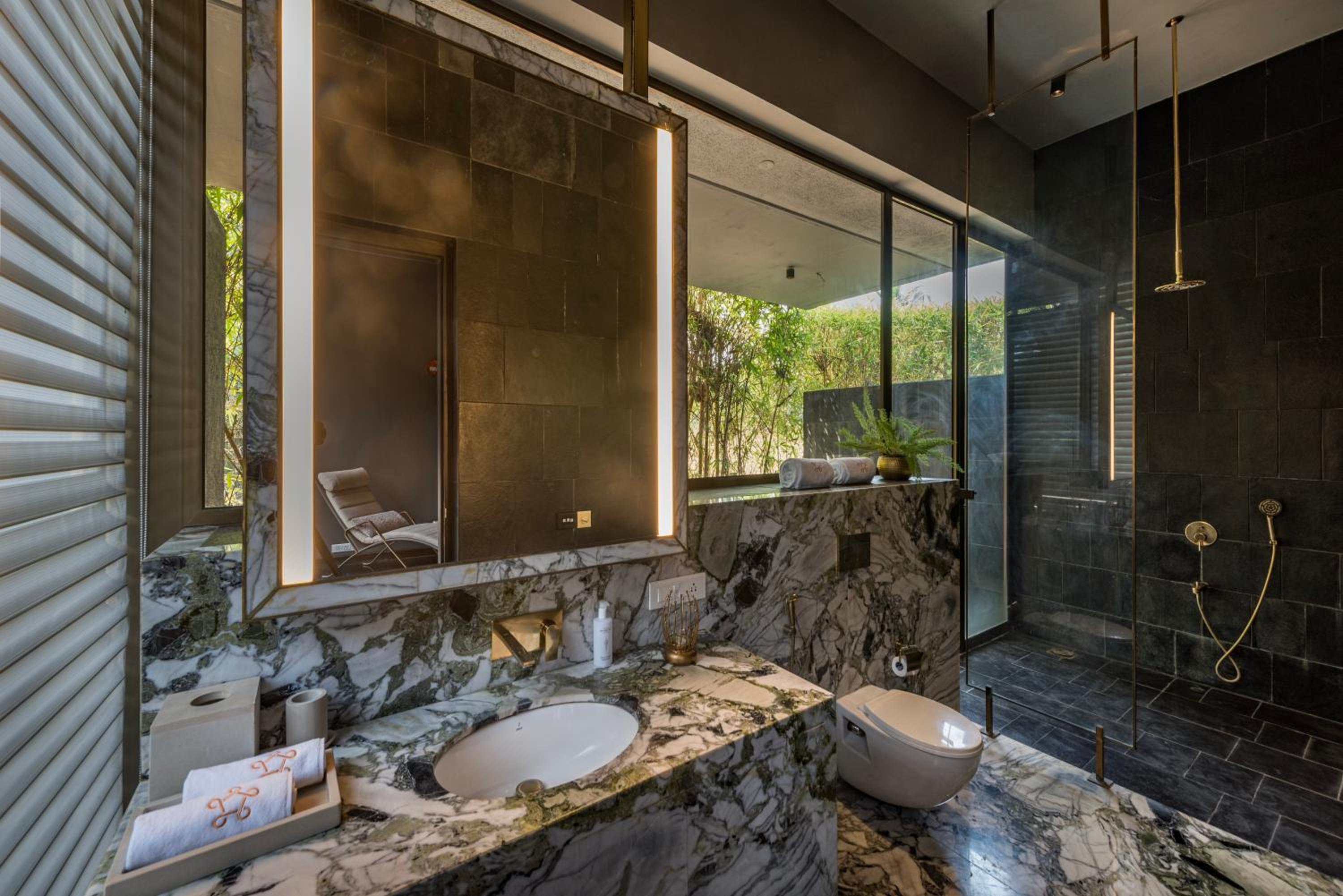 SaffronStays Glasshouse 91 - 4BR luxury villa with pool, art installations, lawns & outdoor dining