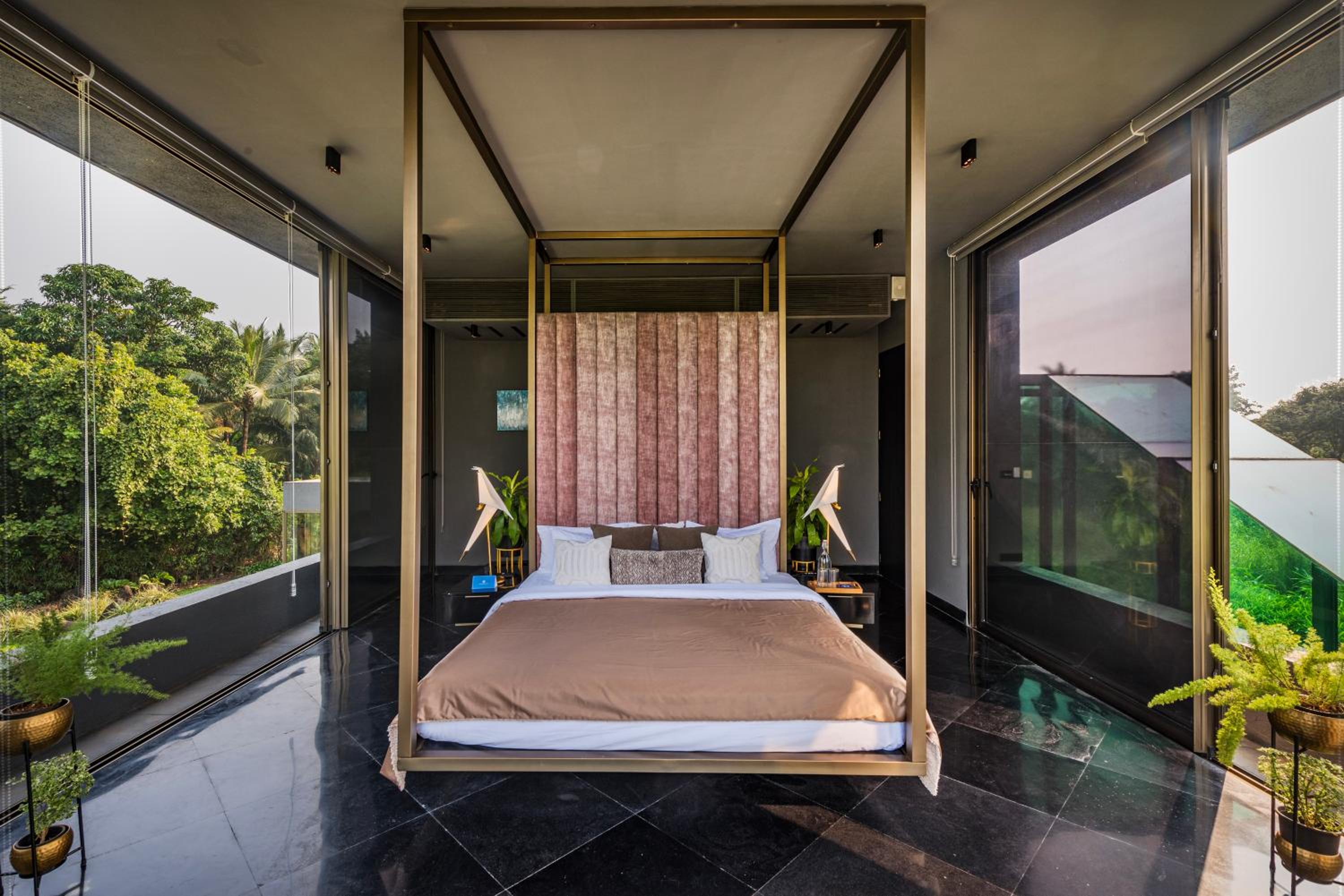 SaffronStays Glasshouse 91 - 4BR luxury villa with pool, art installations, lawns & outdoor dining
