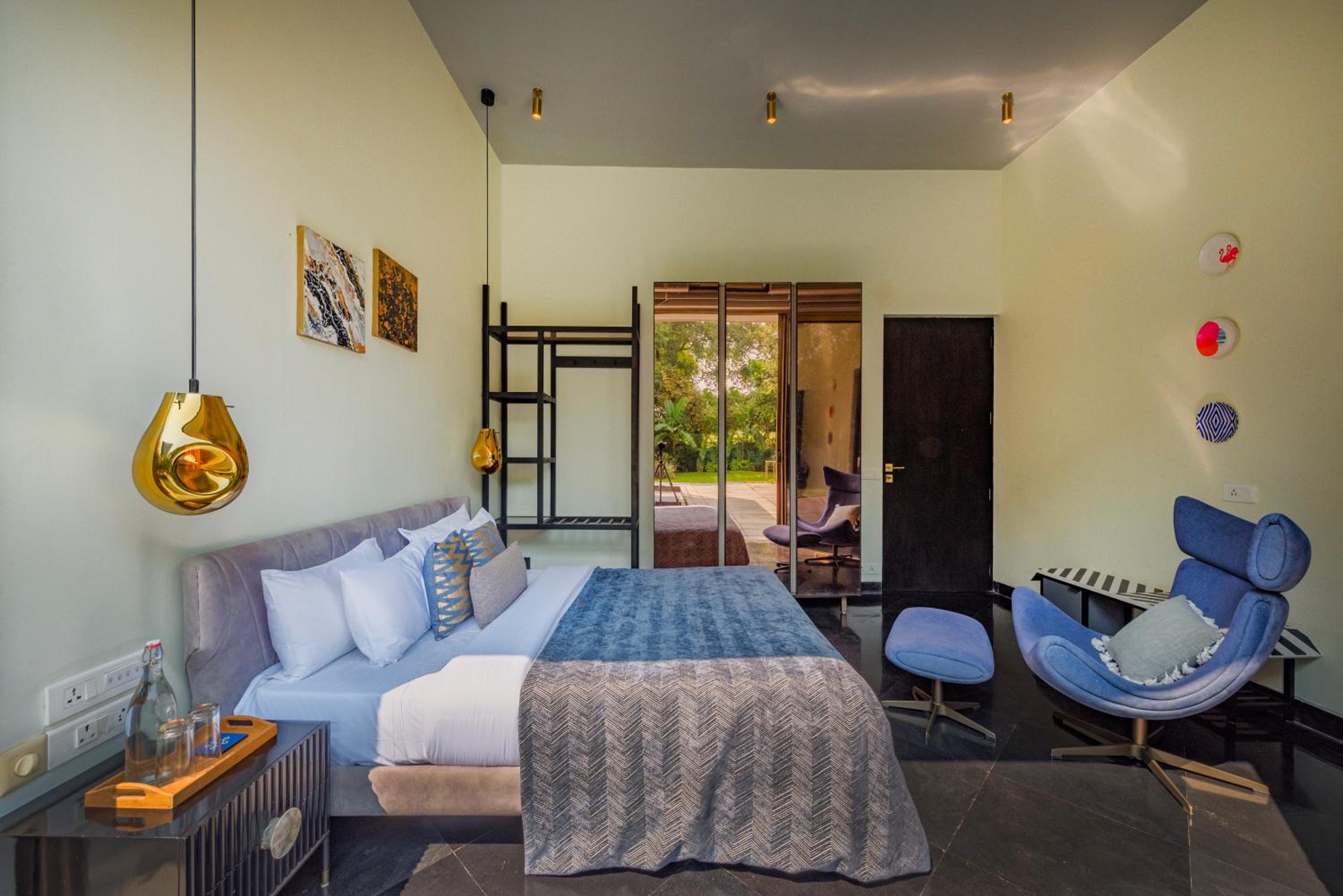 SaffronStays Glasshouse 91 - 4BR luxury villa with pool, art installations, lawns & outdoor dining