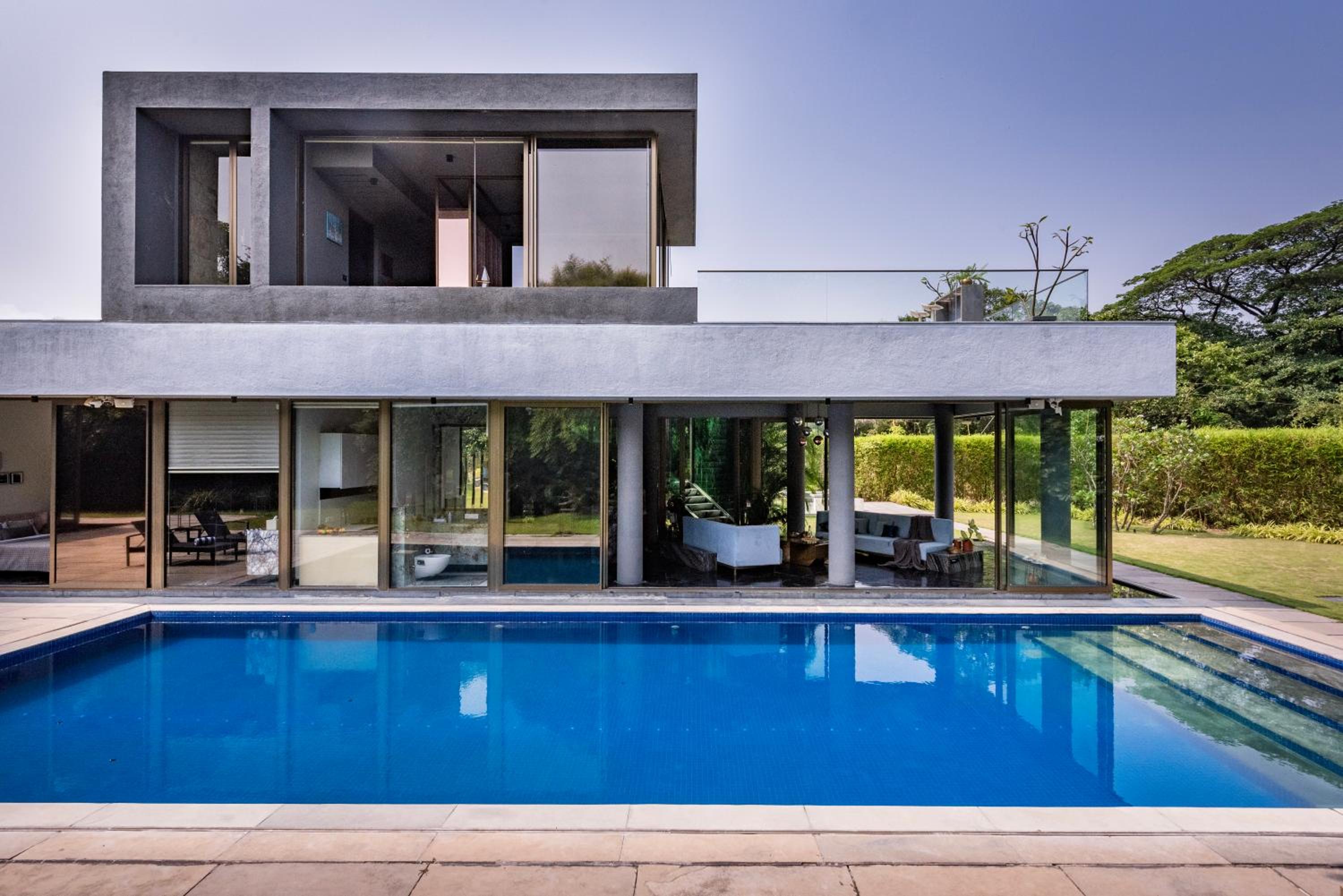 SaffronStays Glasshouse 91 - 4BR luxury villa with pool, art installations, lawns & outdoor dining