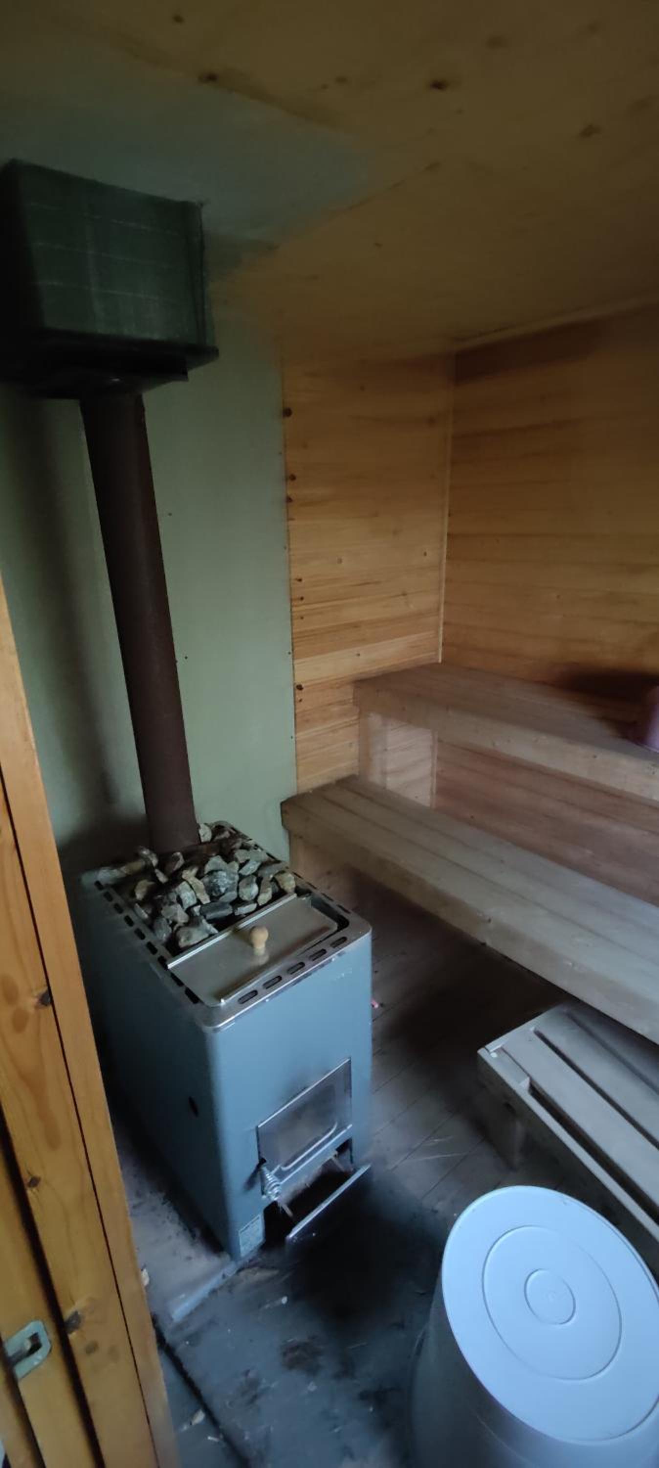Traditional Finnish lakeside off-grid cabin