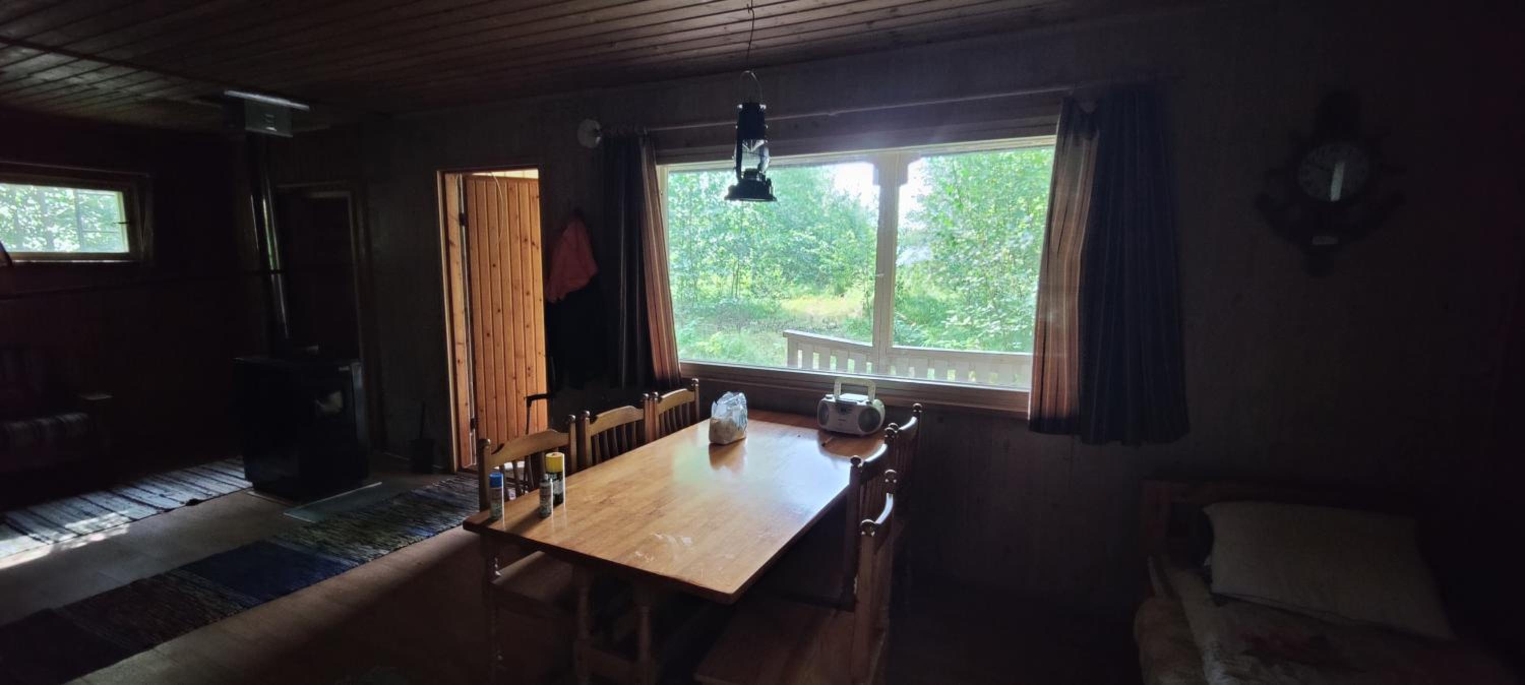 Traditional Finnish lakeside off-grid cabin