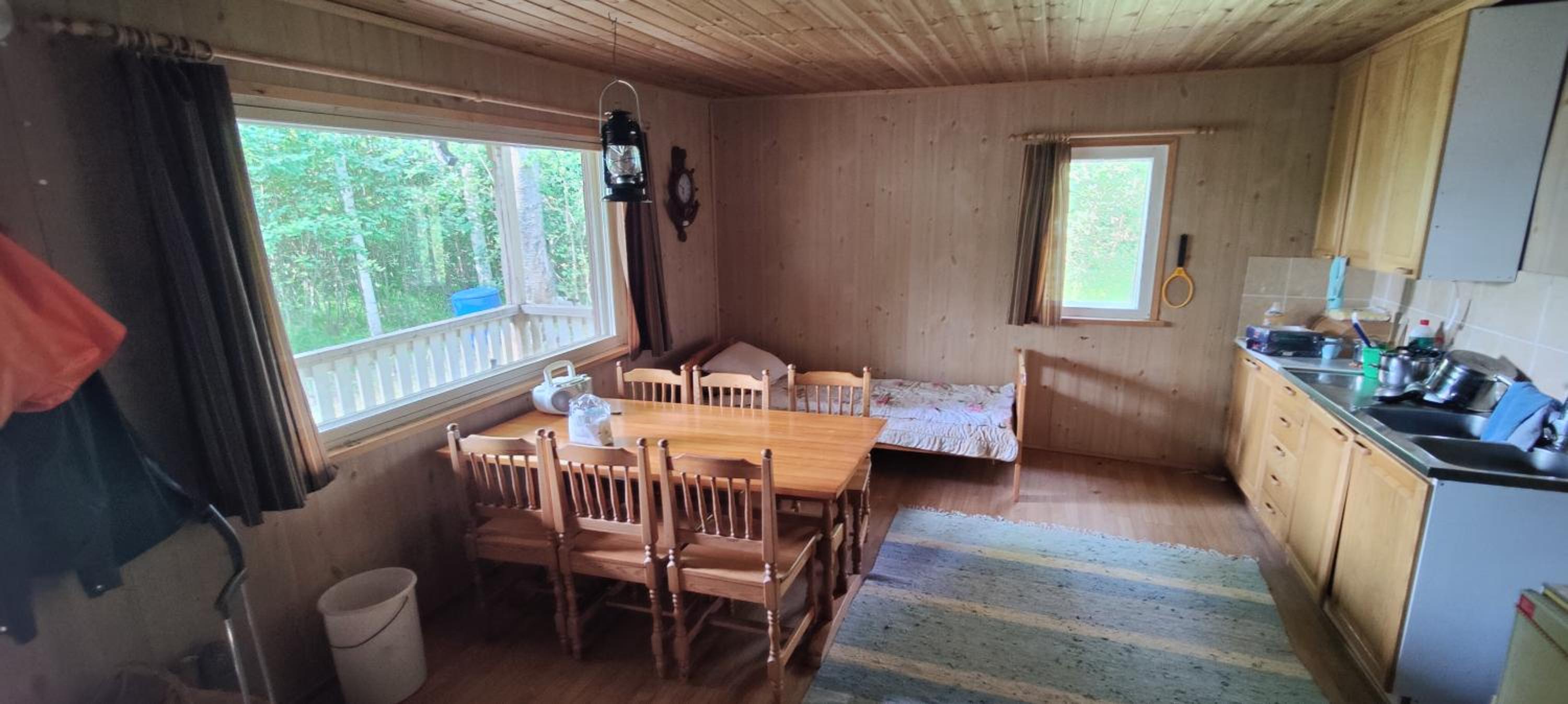 Traditional Finnish lakeside off-grid cabin
