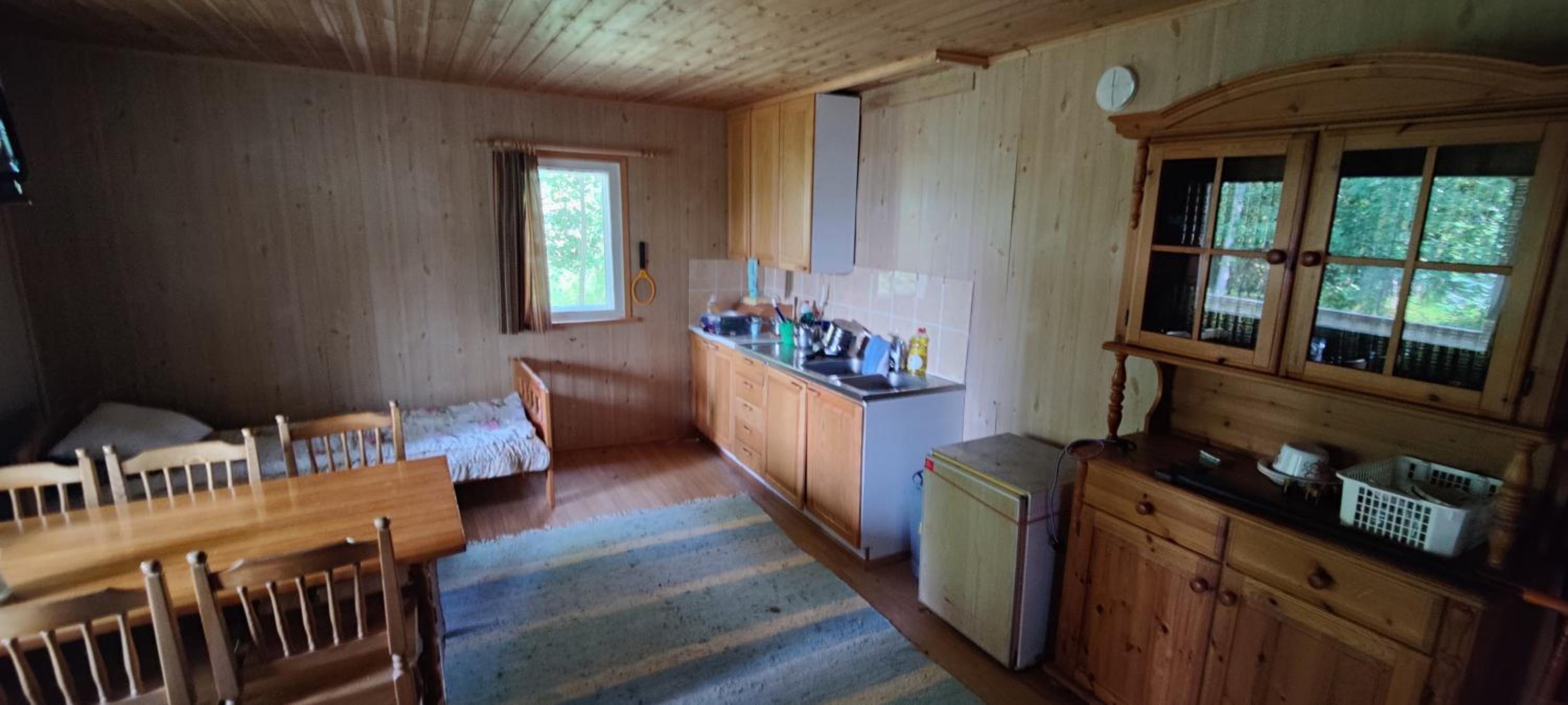 Traditional Finnish lakeside off-grid cabin