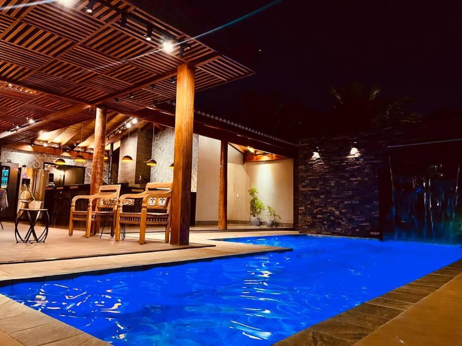 Casa com Piscina Aquecida perto dos parques - Recanto Quinta das Palmeiras Olímpia-SP