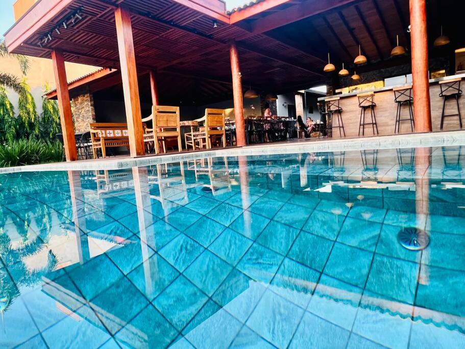 Casa com Piscina Aquecida perto dos parques - Recanto Quinta das Palmeiras Olímpia-SP