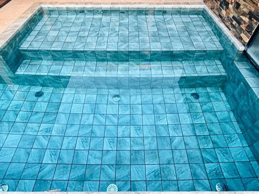 Casa com Piscina Aquecida perto dos parques - Recanto Quinta das Palmeiras Olímpia-SP