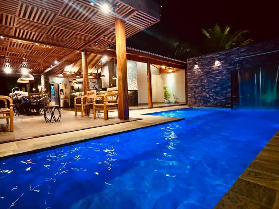 Casa com Piscina Aquecida perto dos parques - Recanto Quinta das Palmeiras Olímpia-SP