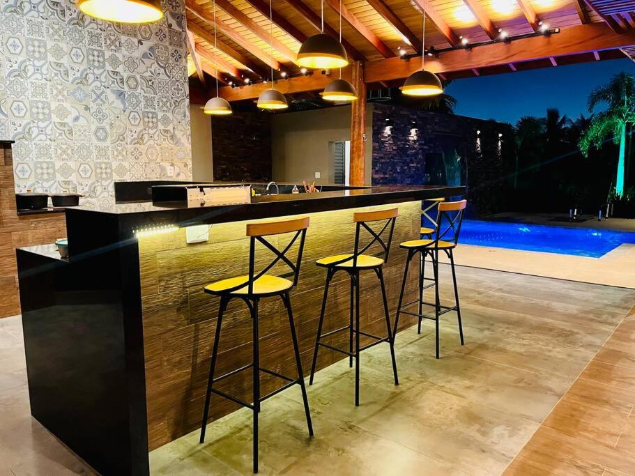 Casa com Piscina Aquecida perto dos parques - Recanto Quinta das Palmeiras Olímpia-SP
