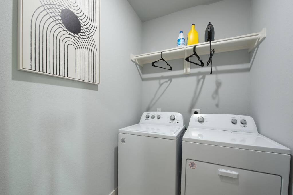 Modern 2024 Townhome with Indoor Hoops Huge TVs and Gray Chic Design view 2