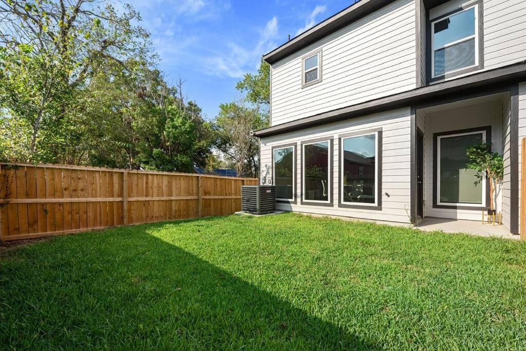 Modern 2024 Townhome with Indoor Hoops Huge TVs and Gray Chic Design view 4