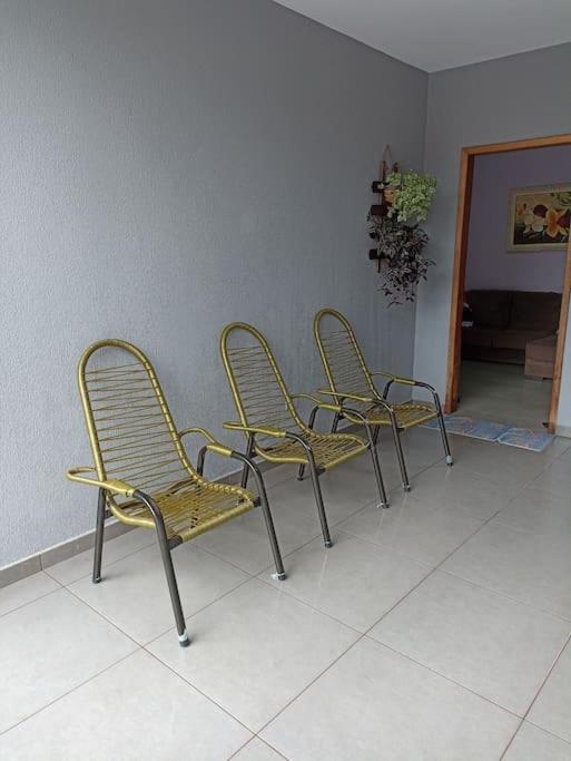 Casa com 2 quartos, ar e garagem!