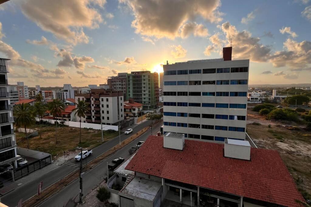 Pé na areia bello mar!