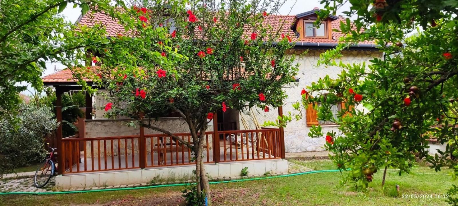 Detached stone house with access to a large garden near beach view 2