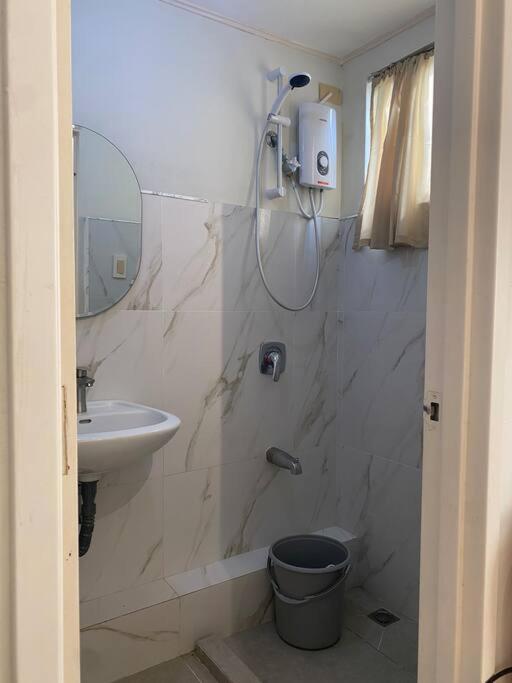 Minimalist Family 2BR Ground Floor Fast Wifi Free Pool beside SM Mall view 2