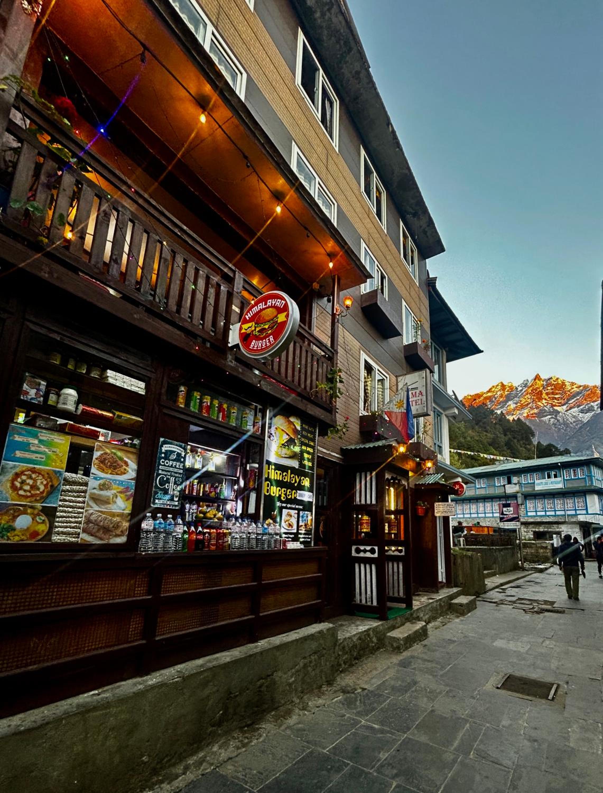 LAMA HOTEL - HIMALAYAN BURGER Experience the best stay in EVEREST with an unforgettable Mountain Flight