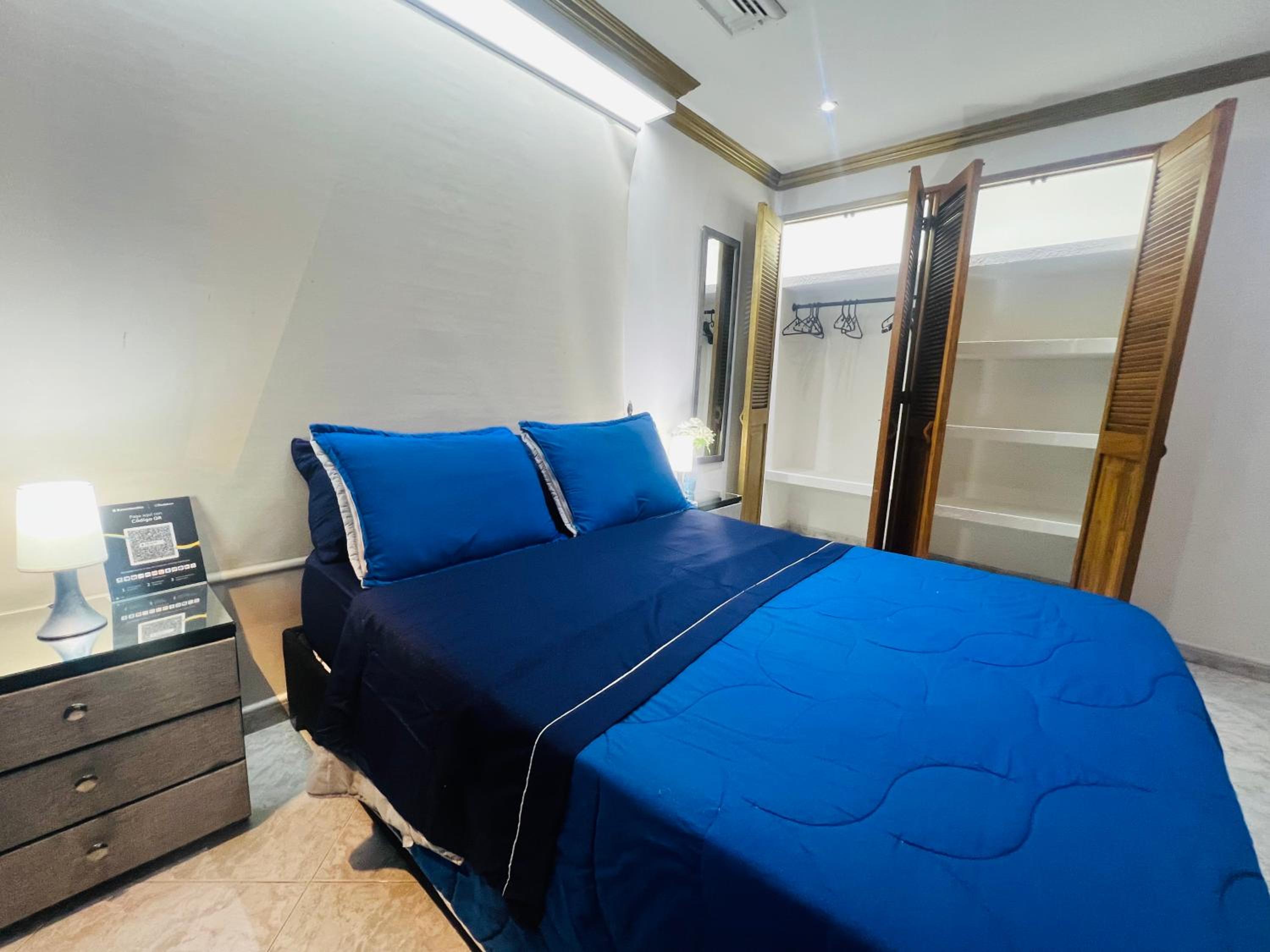 Habitación de lujo con aire acondicionado en condominio privado