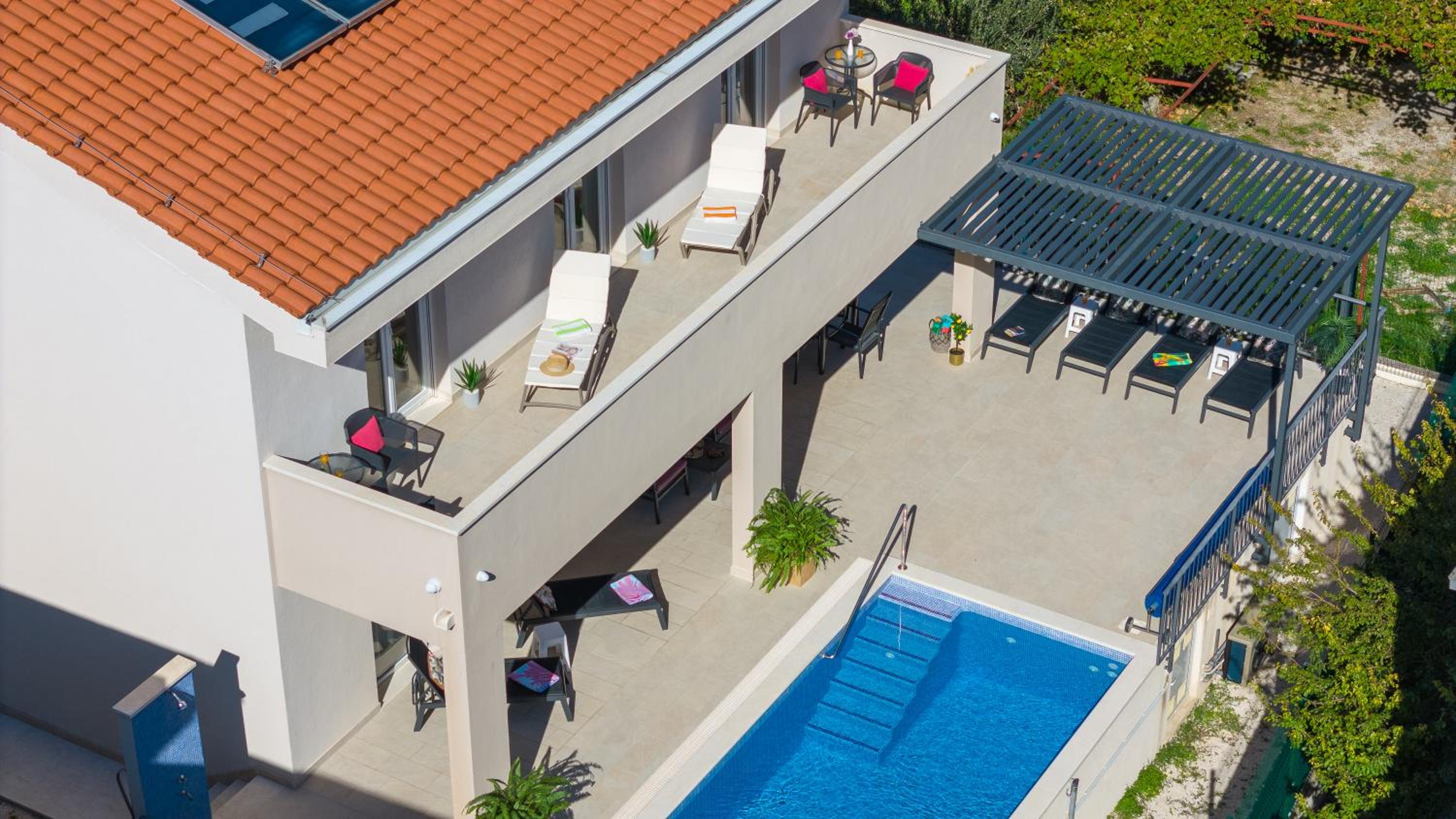 Villa Leonore in Omis with 4 en-suite bedrooms, Heated Pool, Fitness, PS5, completely fenced yard, sandy beach just 3min walk view 3