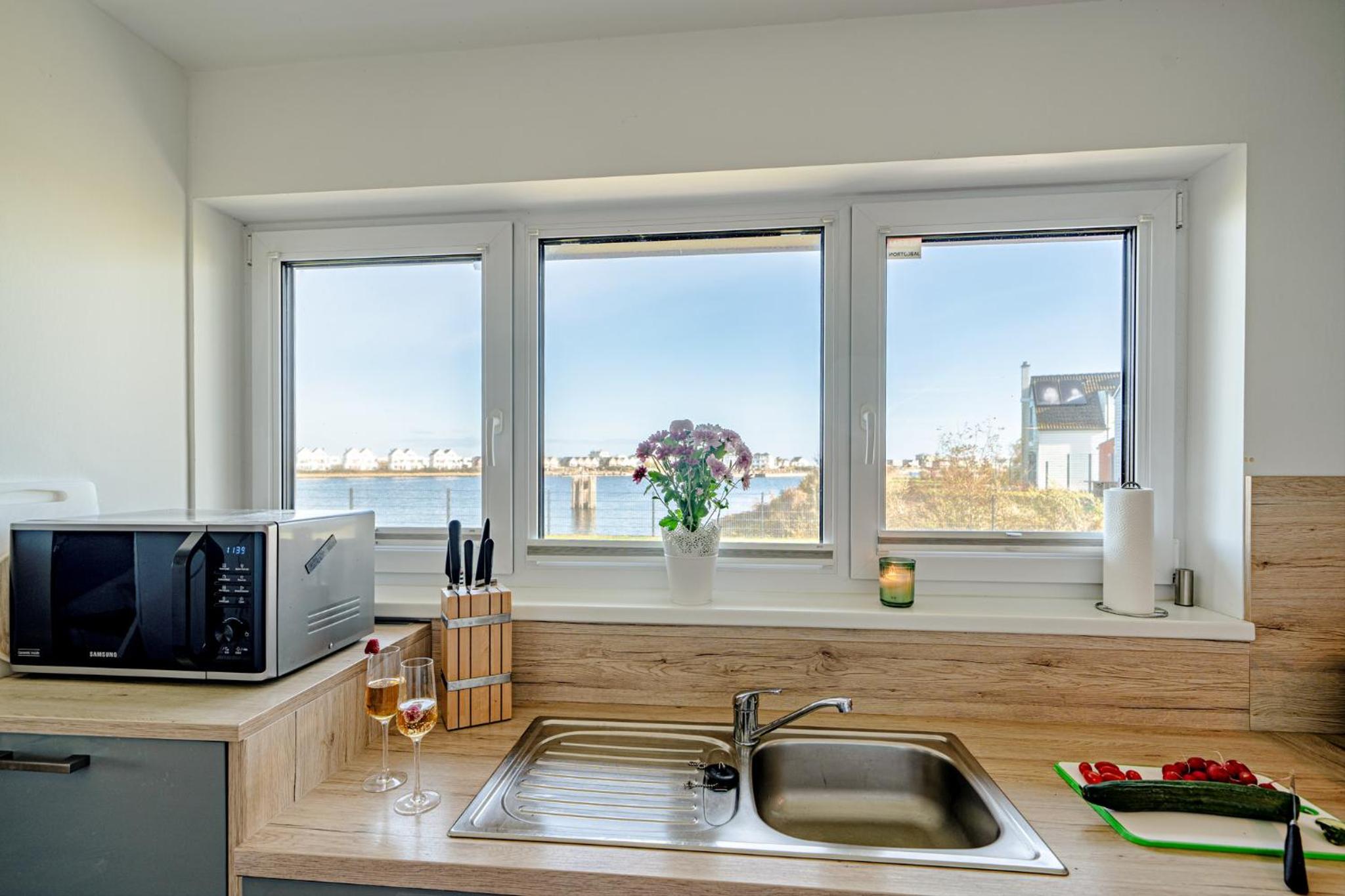 Ferienhaus Am MEER by Seeblick Ferien ORO, direkte Wasserlage,Sauna,Kamin