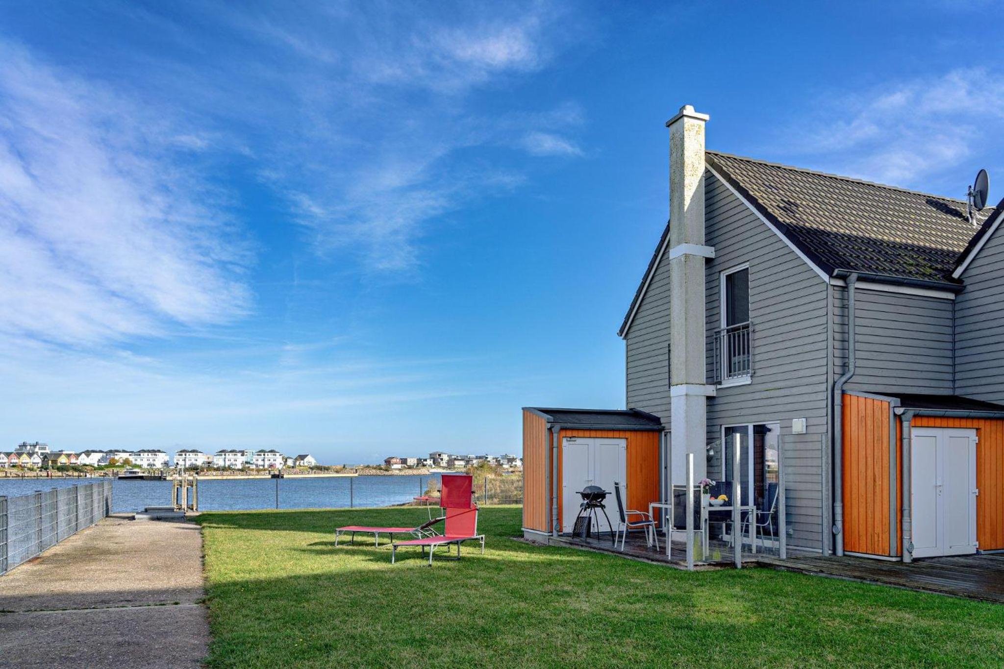 Ferienhaus-Am-Meer-by-Seeblick-Ferien-ORO-direkte-Wasserlage-Sauna-Kamin en Olpenitz