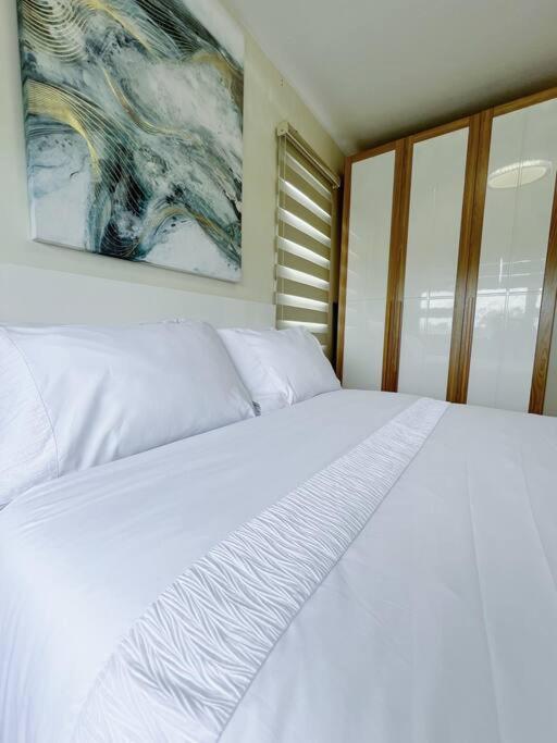 Modern Cozy 2BR Smart Lock Condo with Netflix 4K and YouTube Premium at Seawind view 2