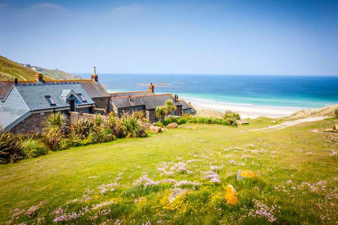 Sandpipers Beach Cottage Great Sea Views Patio view 4