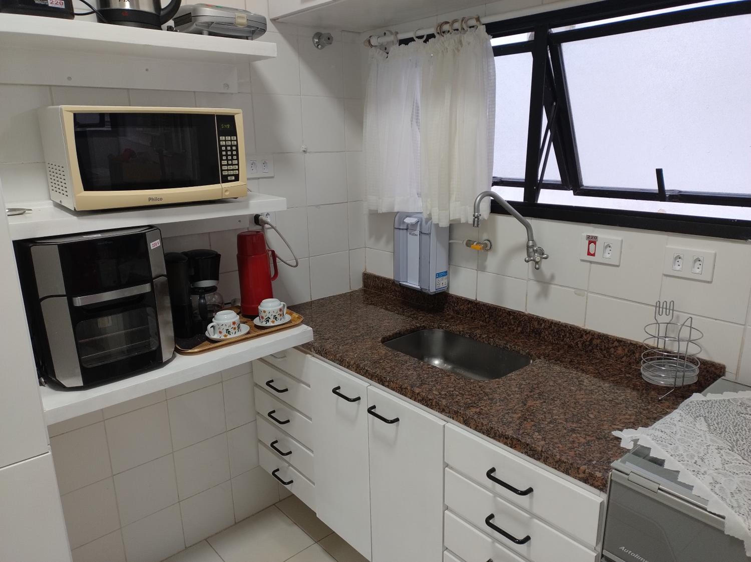 50 m praia pitangueiras Guarujá espaço familiar