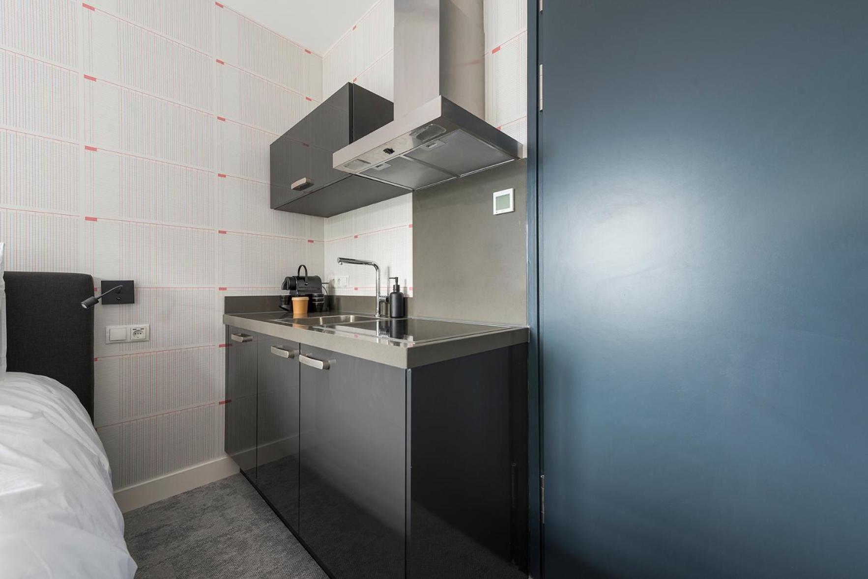 Freshly Renovated Stay w kitchen and bathroom view 3