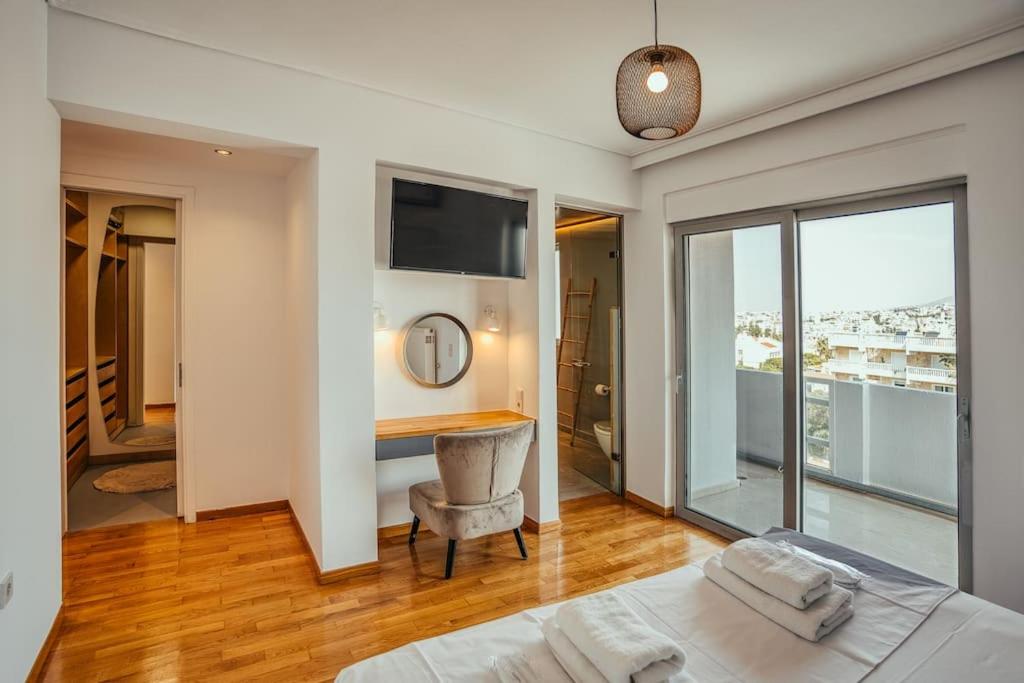 Grand Sea View Apartment 3' from Kavouri Beach