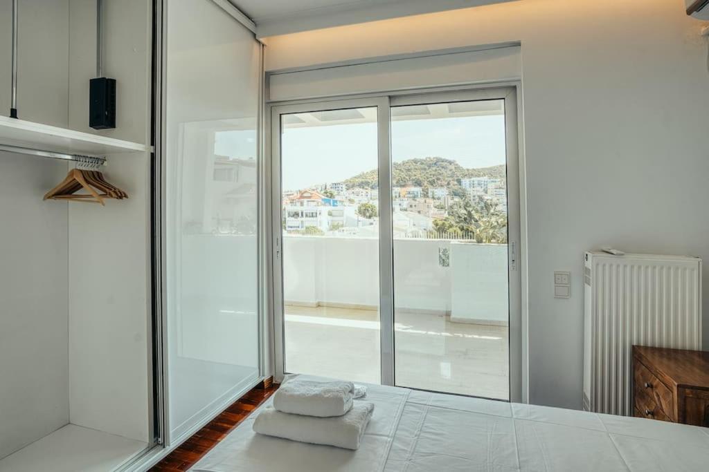 Grand Sea View Apartment 3' from Kavouri Beach