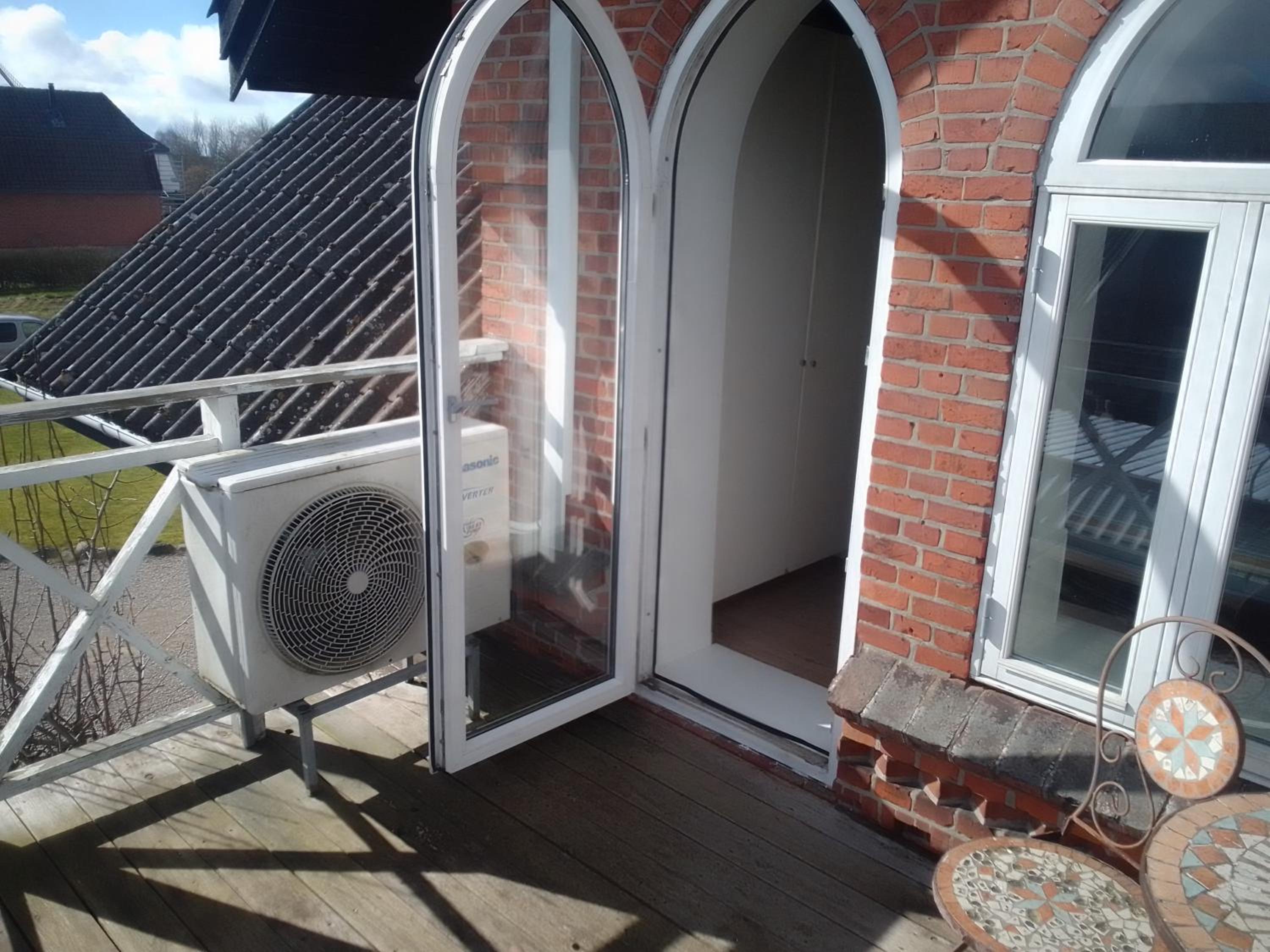 Apartment with balcony in villa Hojer