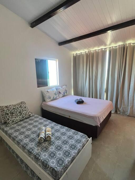 Casa Pé na Areia