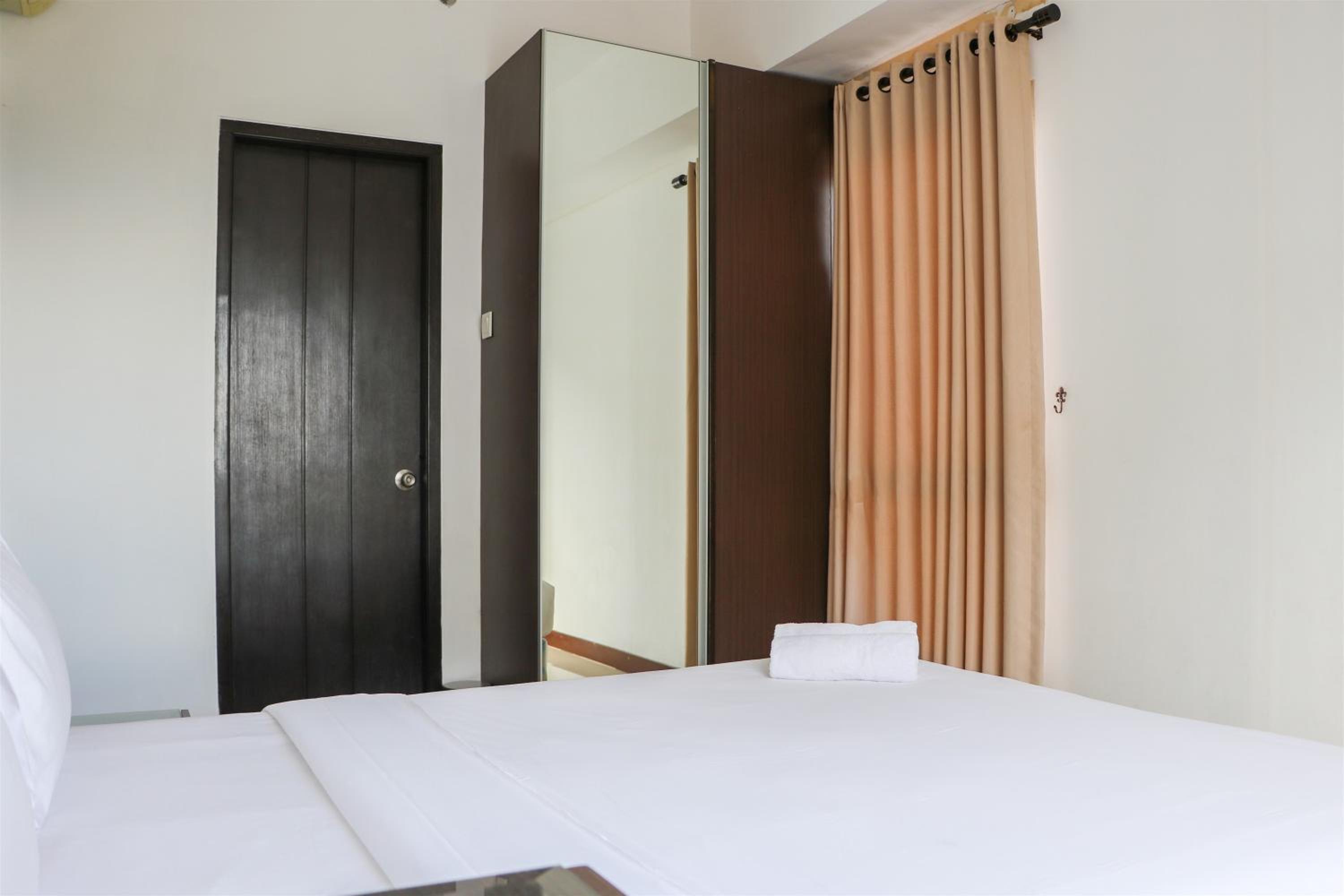 Relaxing 2BR Apartment at Scientia Residence By Travelio view 4